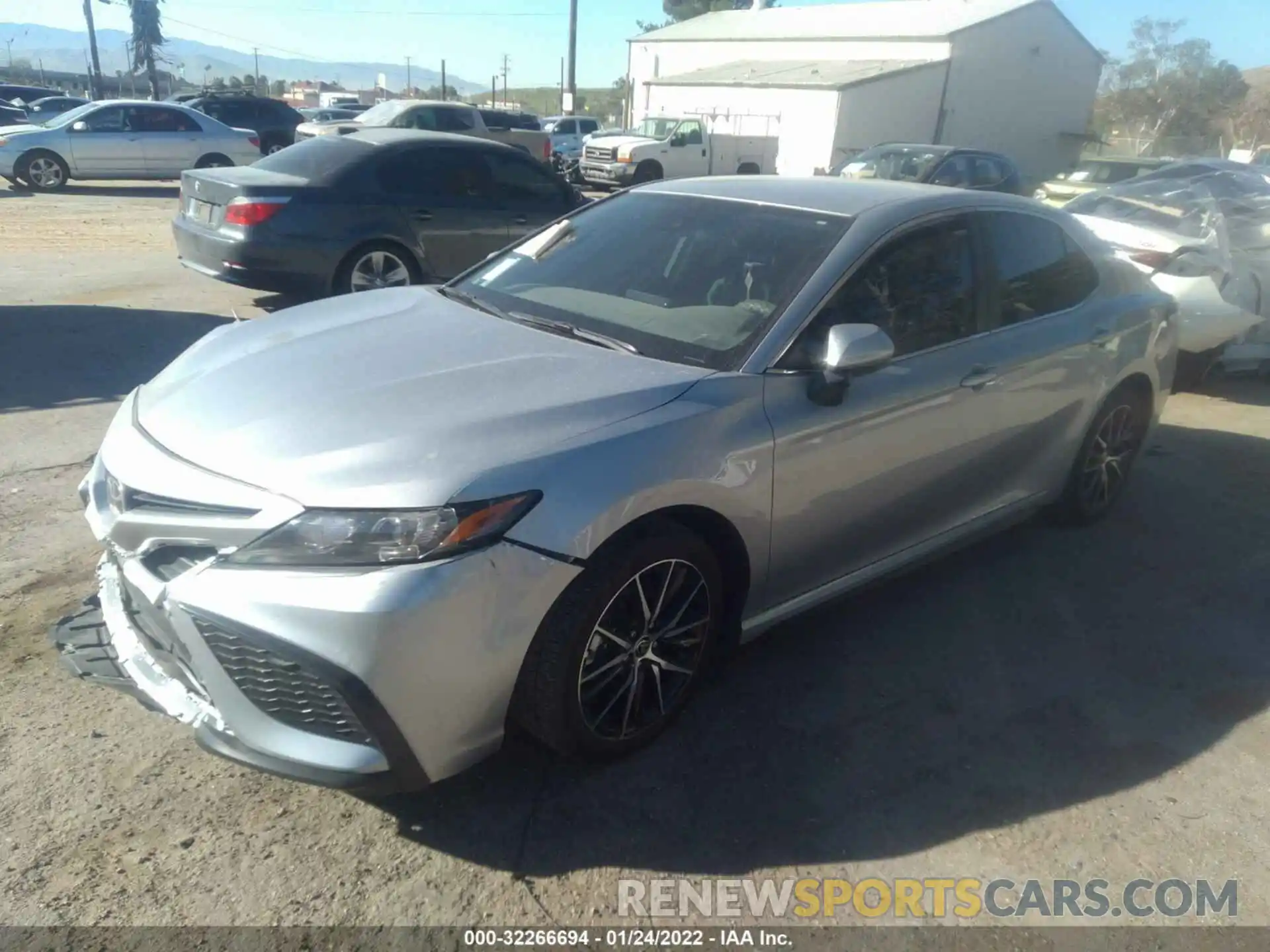 2 Photograph of a damaged car 4T1G11AKXMU566274 TOYOTA CAMRY 2021