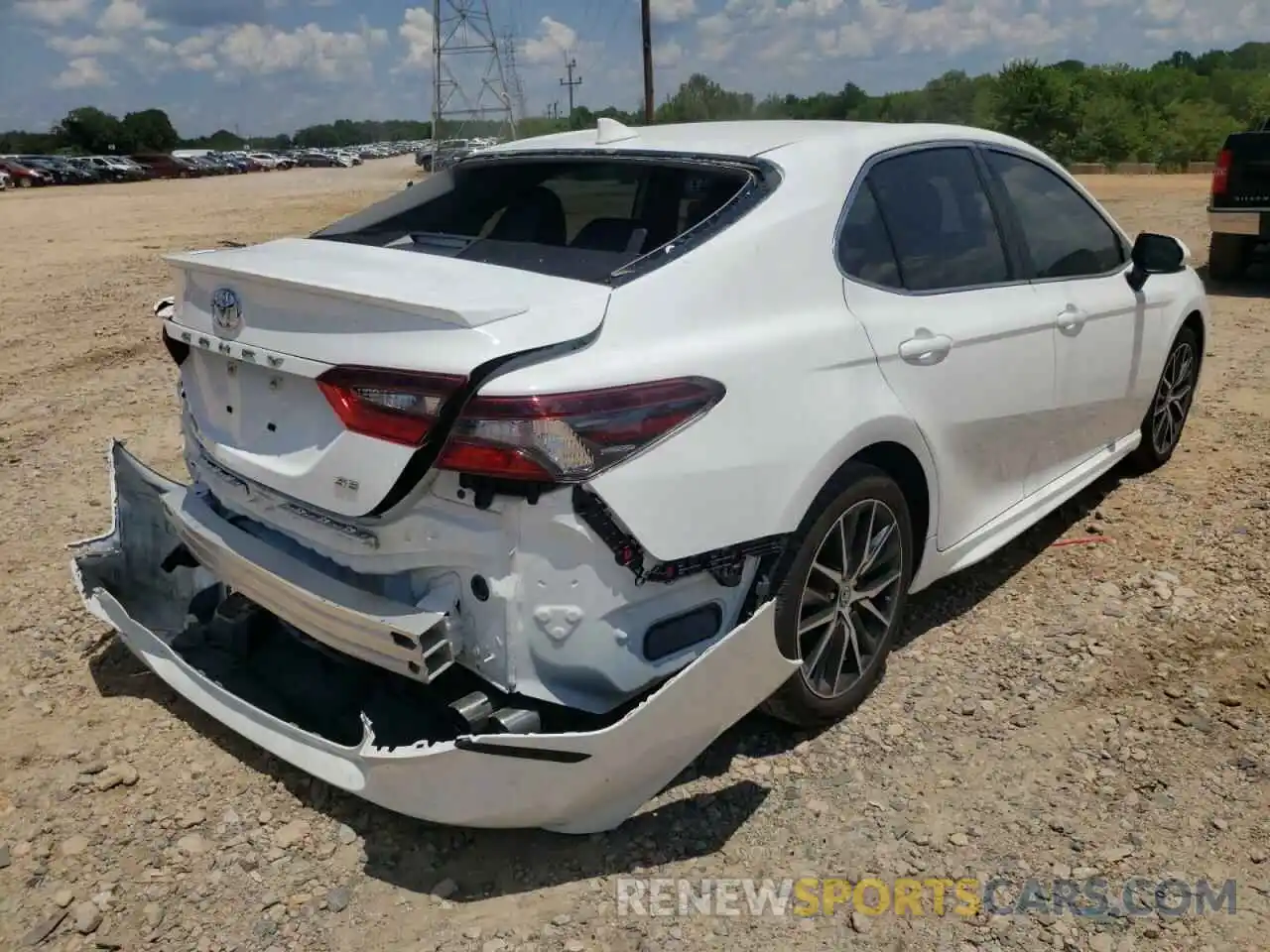 4 Photograph of a damaged car 4T1G11AKXMU569269 TOYOTA CAMRY 2021