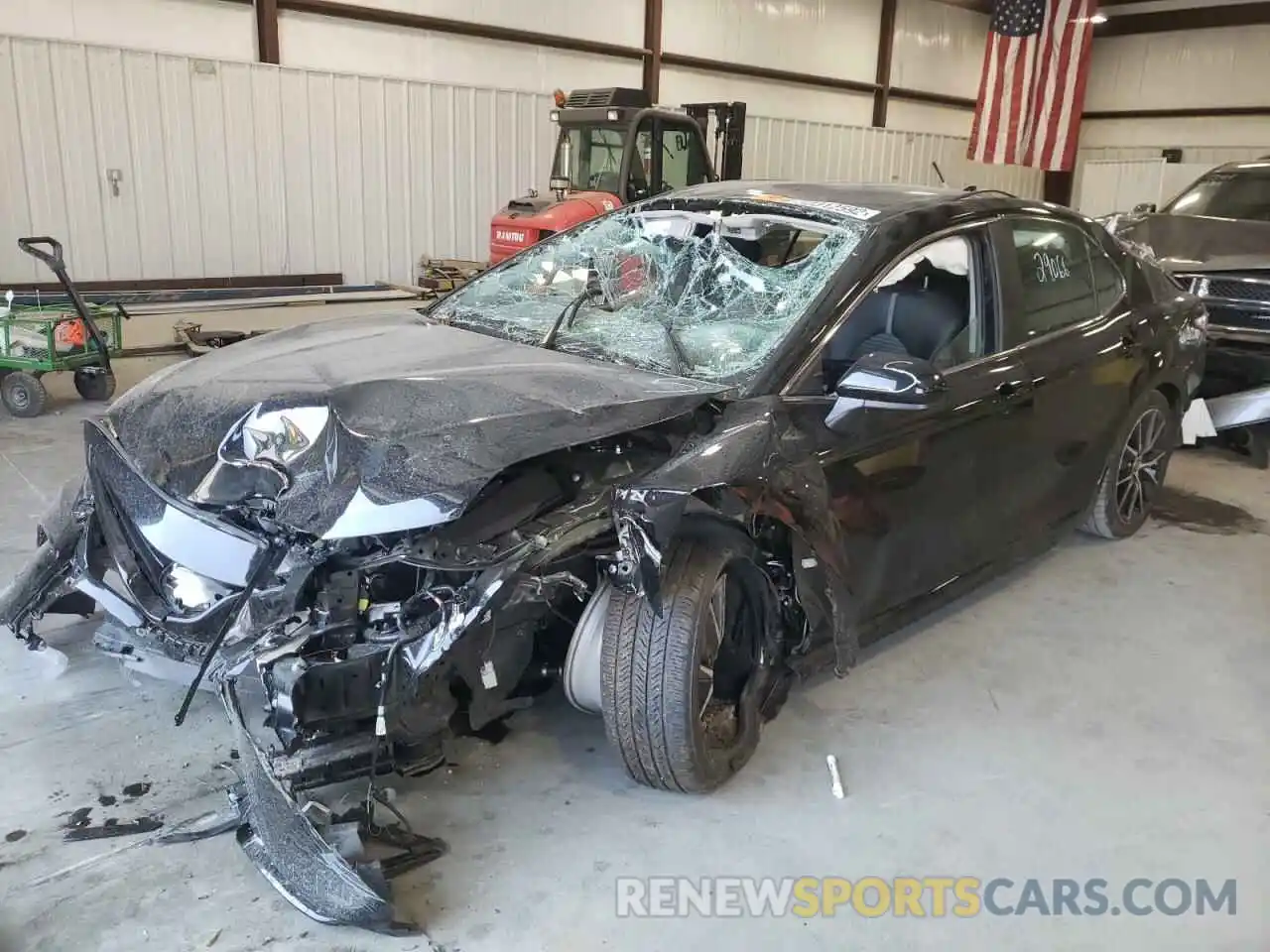 2 Photograph of a damaged car 4T1G11AKXMU574617 TOYOTA CAMRY 2021