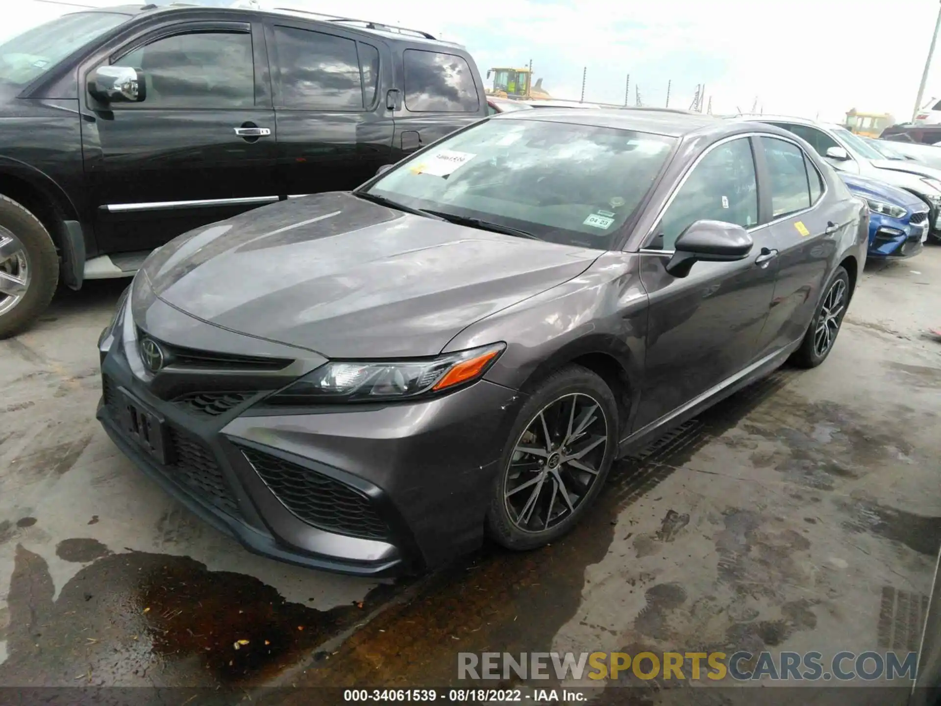 2 Photograph of a damaged car 4T1G11AKXMU574987 TOYOTA CAMRY 2021