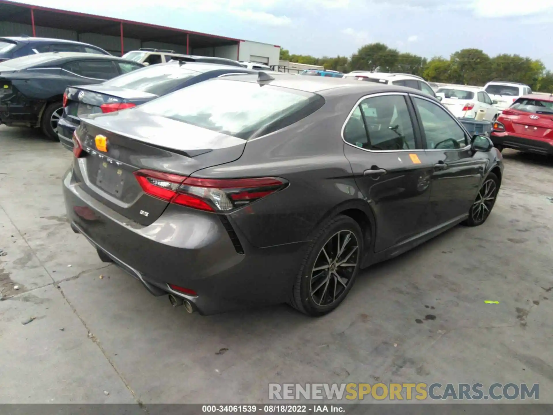 4 Photograph of a damaged car 4T1G11AKXMU574987 TOYOTA CAMRY 2021