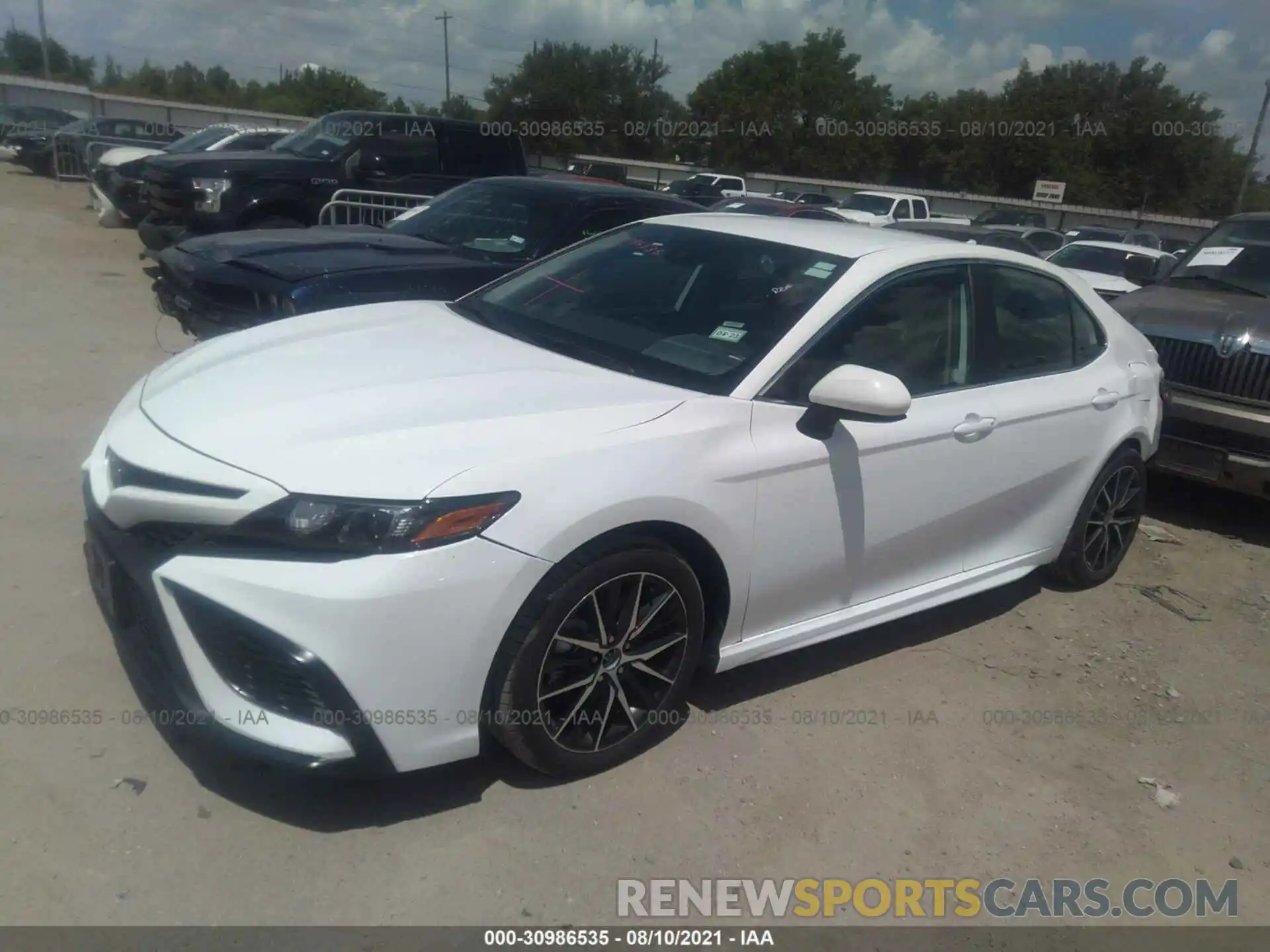 2 Photograph of a damaged car 4T1G11AKXMU580286 TOYOTA CAMRY 2021