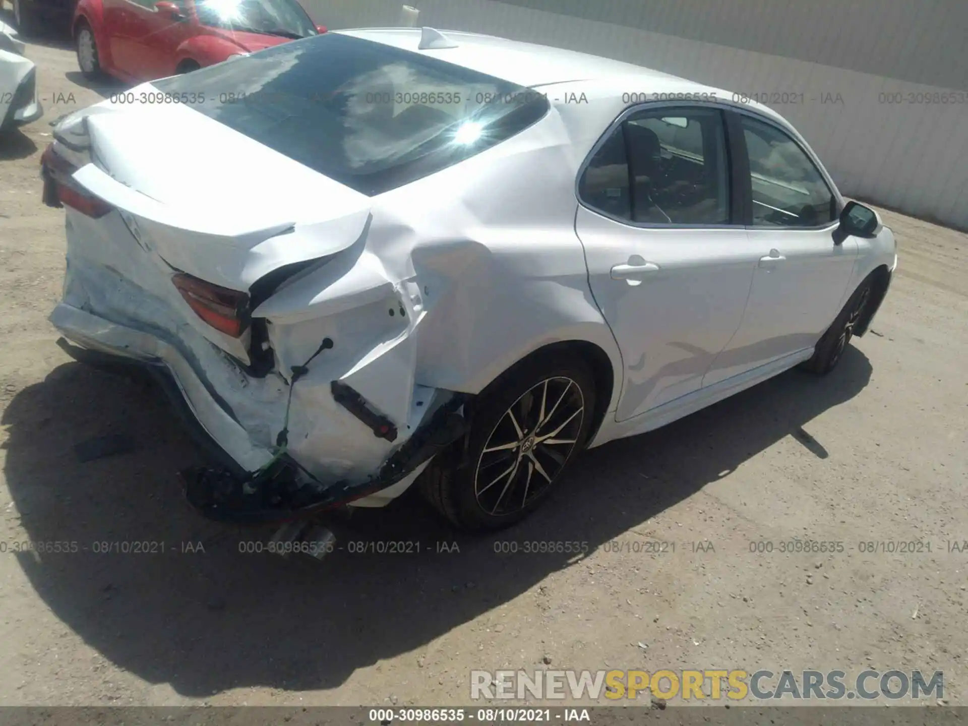 4 Photograph of a damaged car 4T1G11AKXMU580286 TOYOTA CAMRY 2021