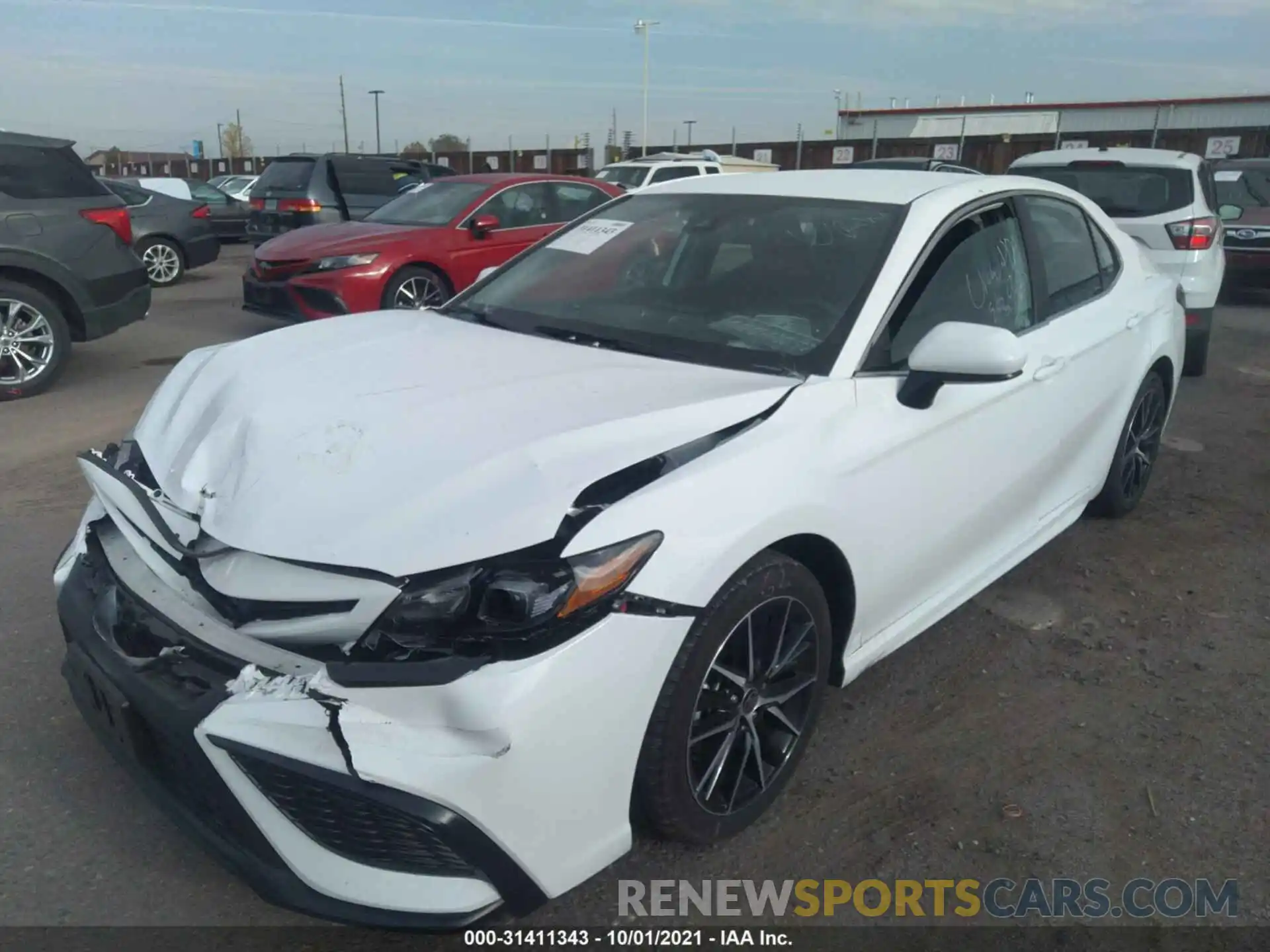 2 Photograph of a damaged car 4T1G11AKXMU585472 TOYOTA CAMRY 2021