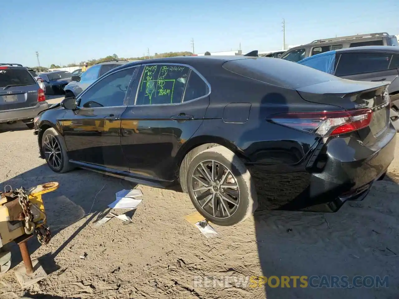 2 Photograph of a damaged car 4T1G11AKXMU586234 TOYOTA CAMRY 2021