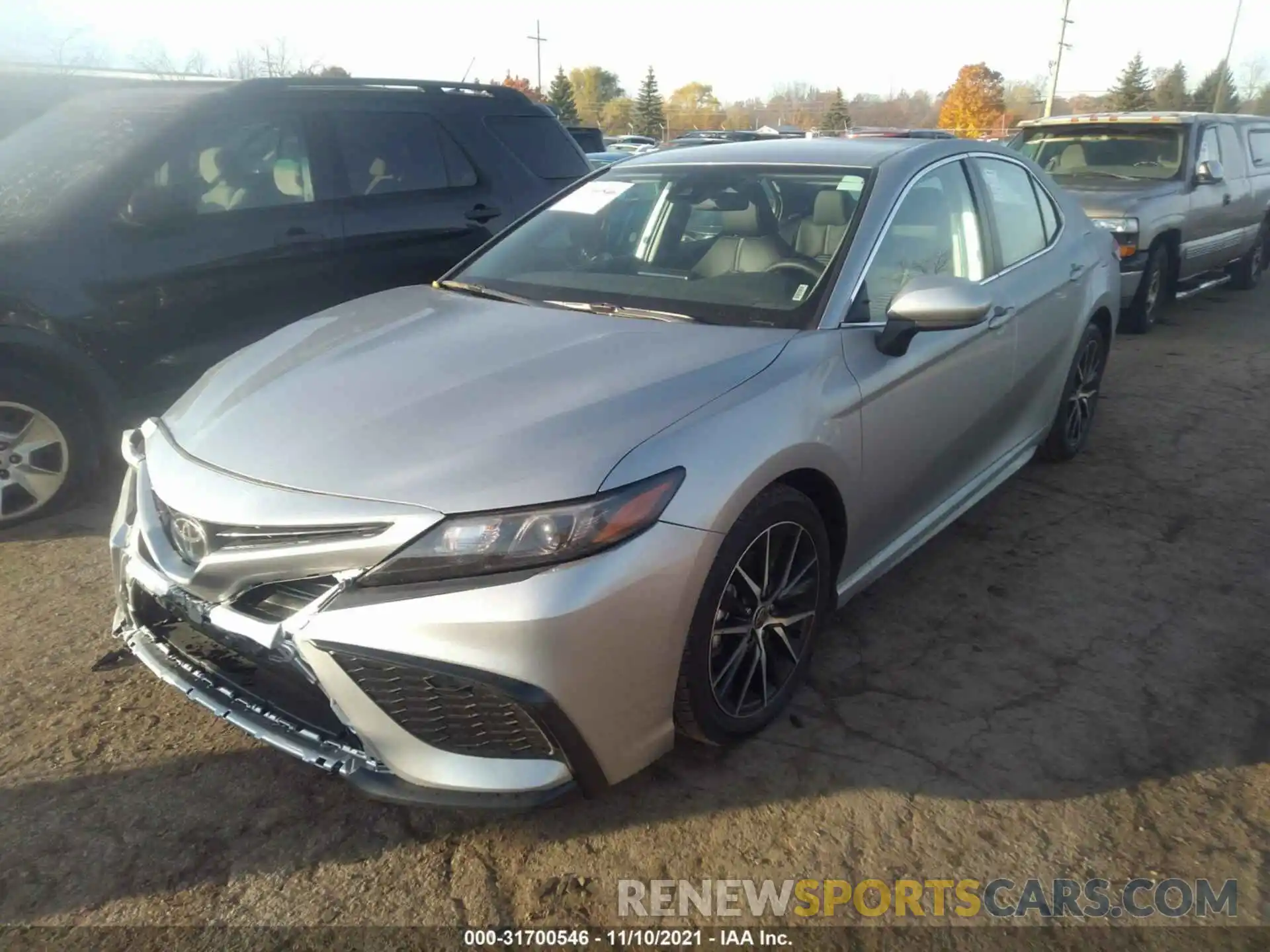 2 Photograph of a damaged car 4T1G11AKXMU592745 TOYOTA CAMRY 2021