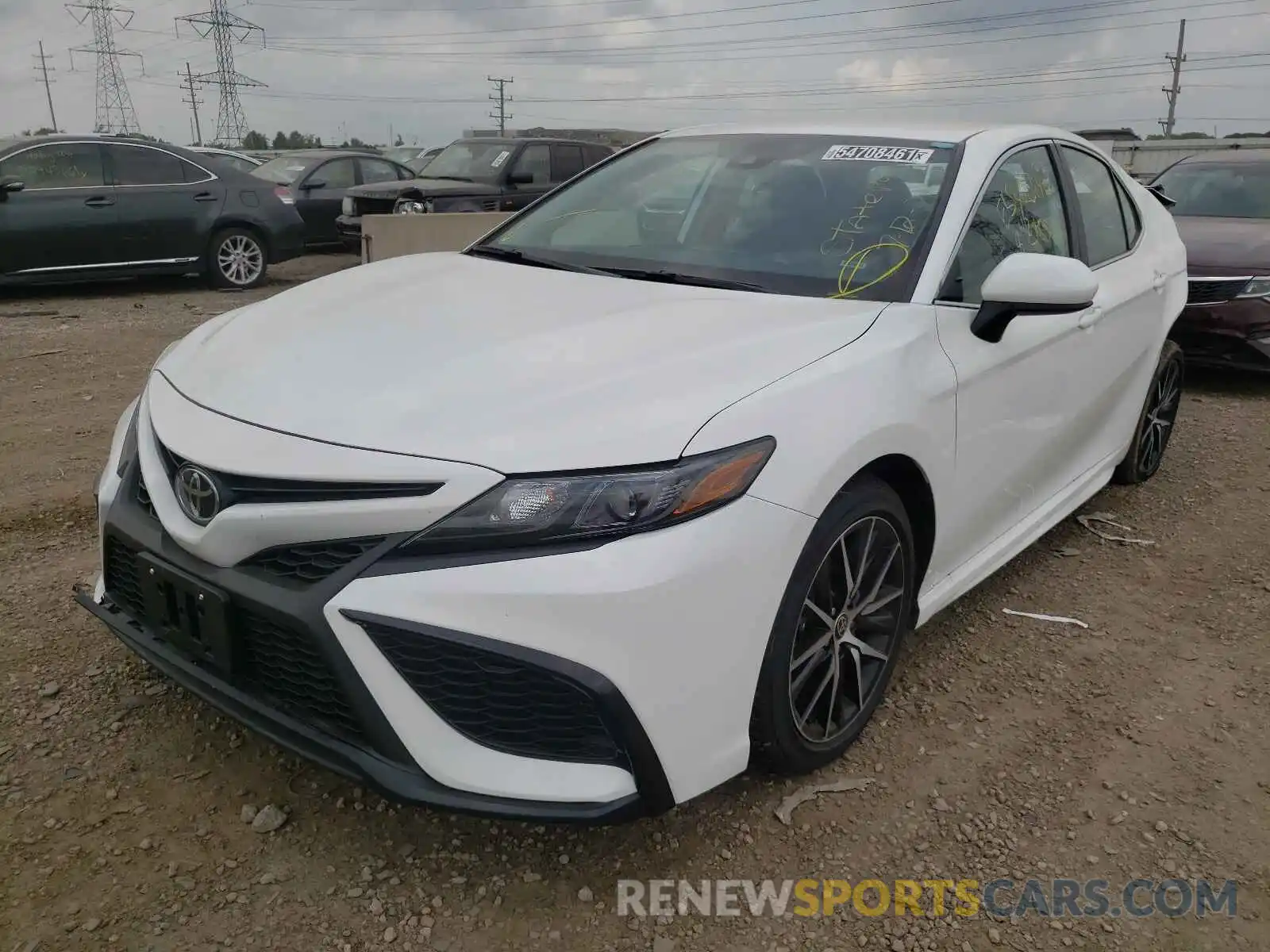 2 Photograph of a damaged car 4T1G11AKXMU593328 TOYOTA CAMRY 2021