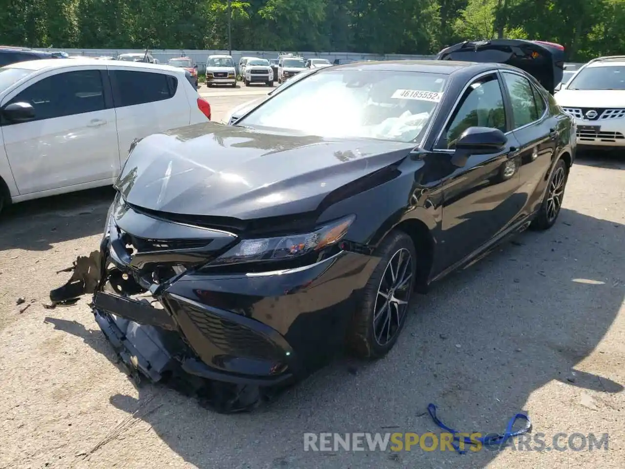 2 Photograph of a damaged car 4T1G11AKXMU599209 TOYOTA CAMRY 2021