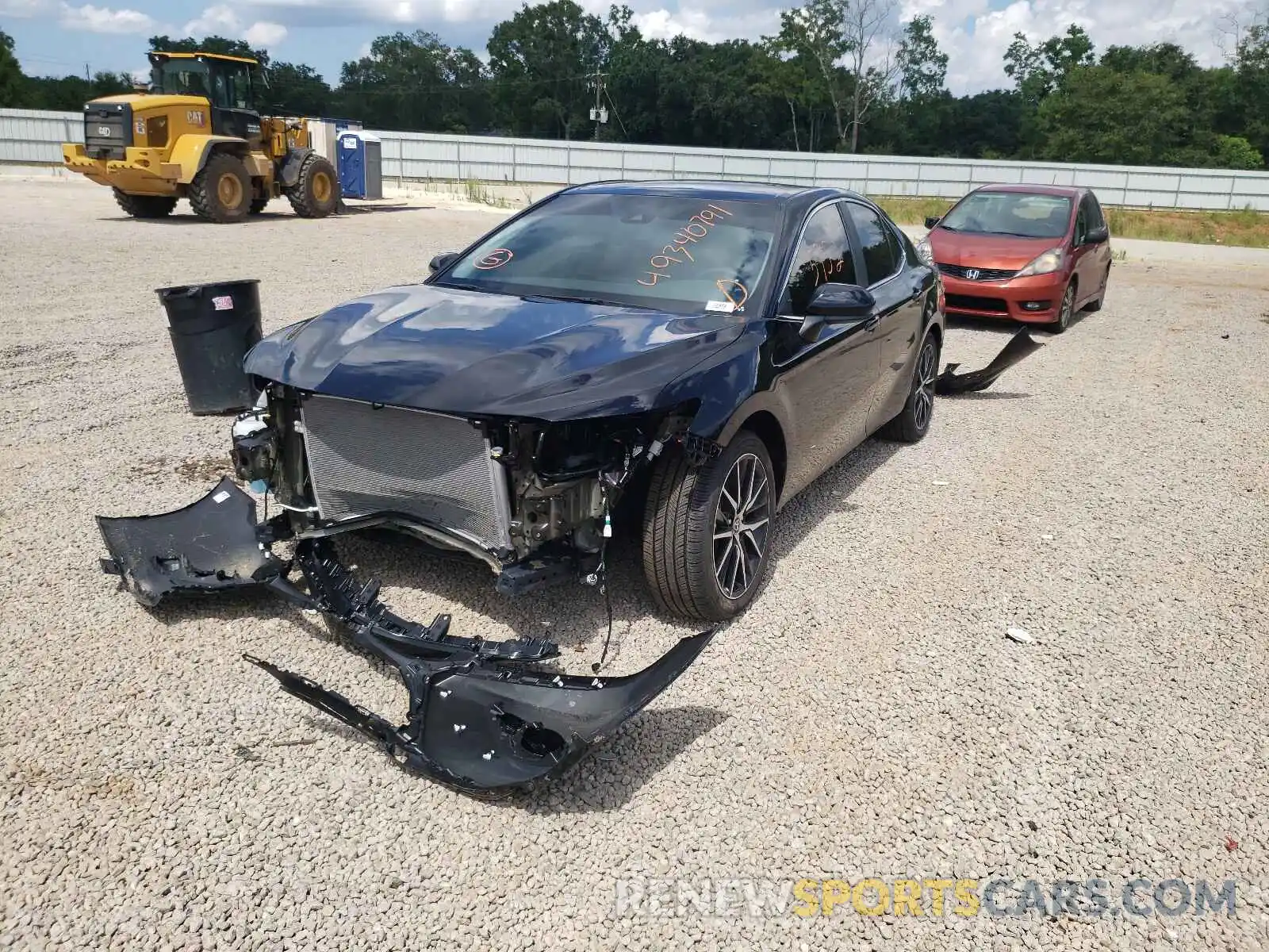 2 Photograph of a damaged car 4T1G11BK0MU023109 TOYOTA CAMRY 2021