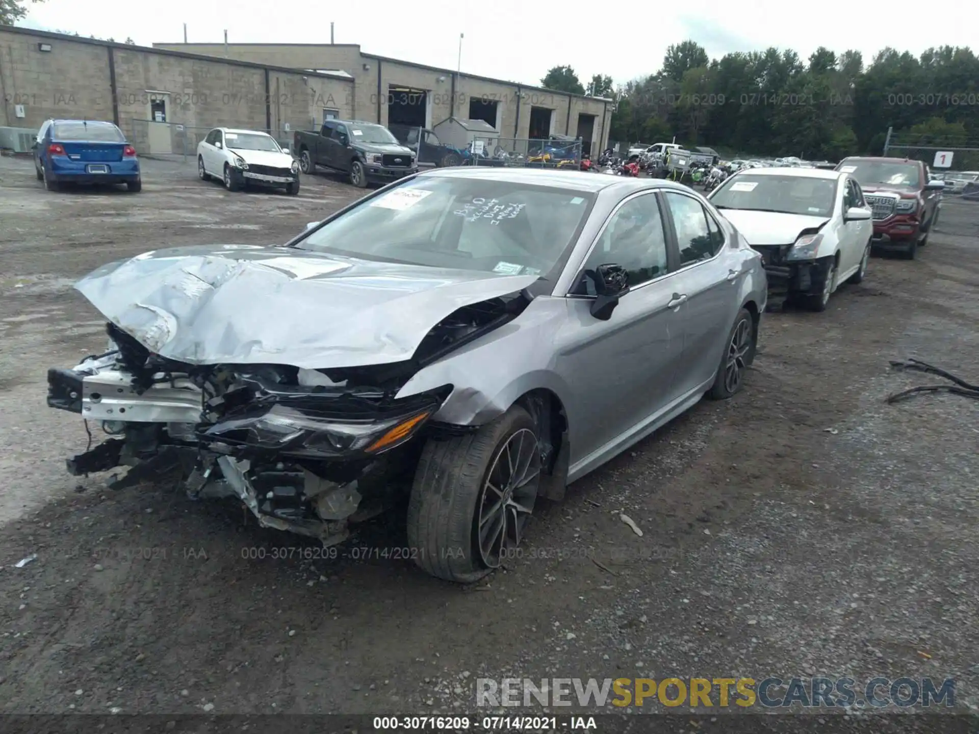 2 Photograph of a damaged car 4T1G11BK0MU027872 TOYOTA CAMRY 2021