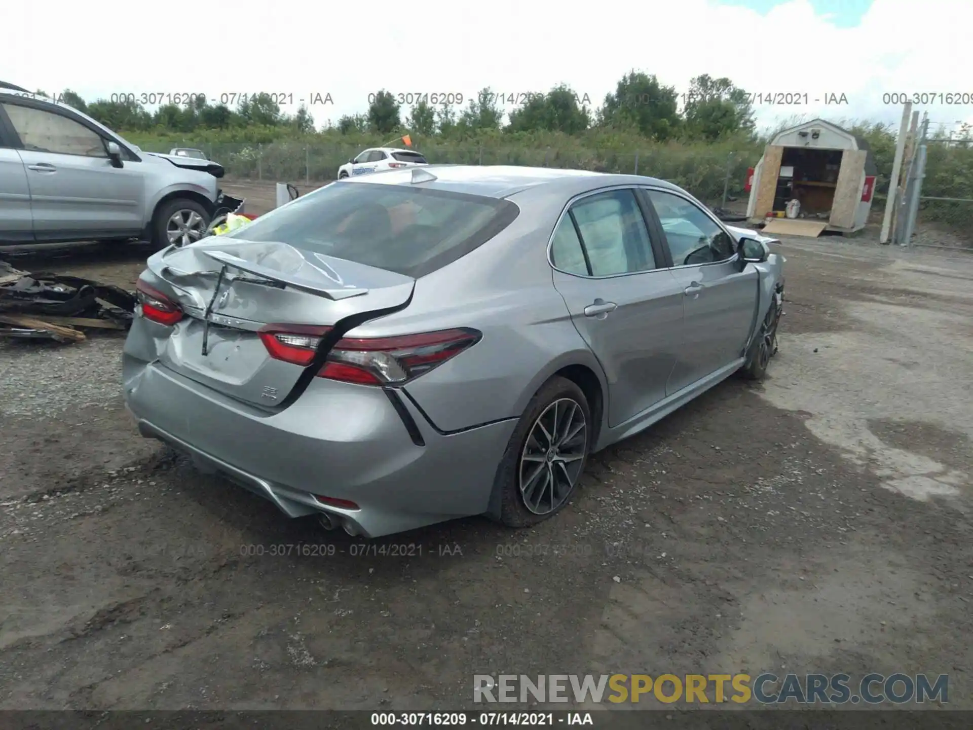 4 Photograph of a damaged car 4T1G11BK0MU027872 TOYOTA CAMRY 2021