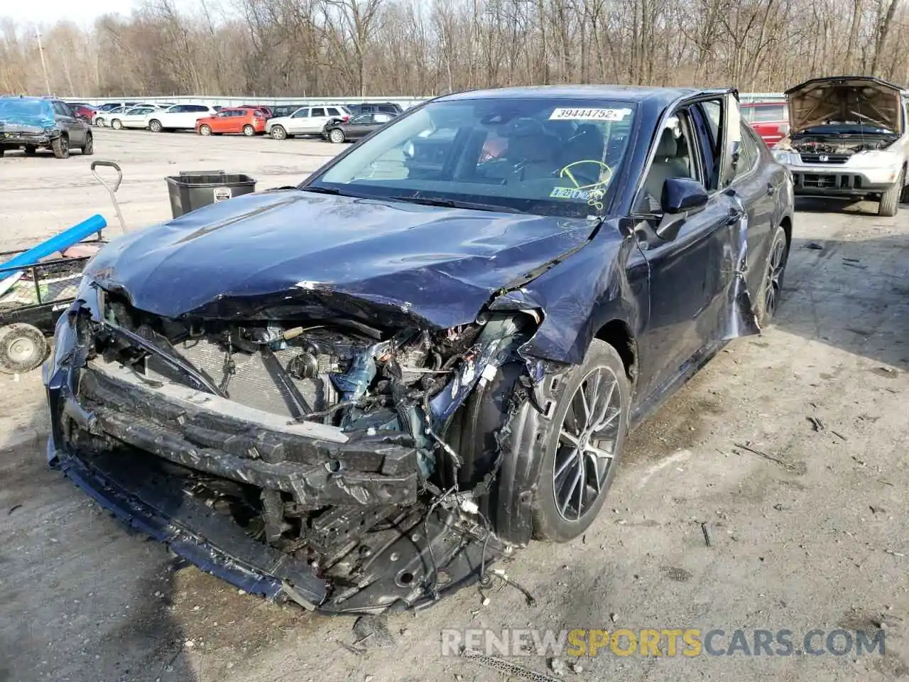 2 Photograph of a damaged car 4T1G11BK1MU021661 TOYOTA CAMRY 2021