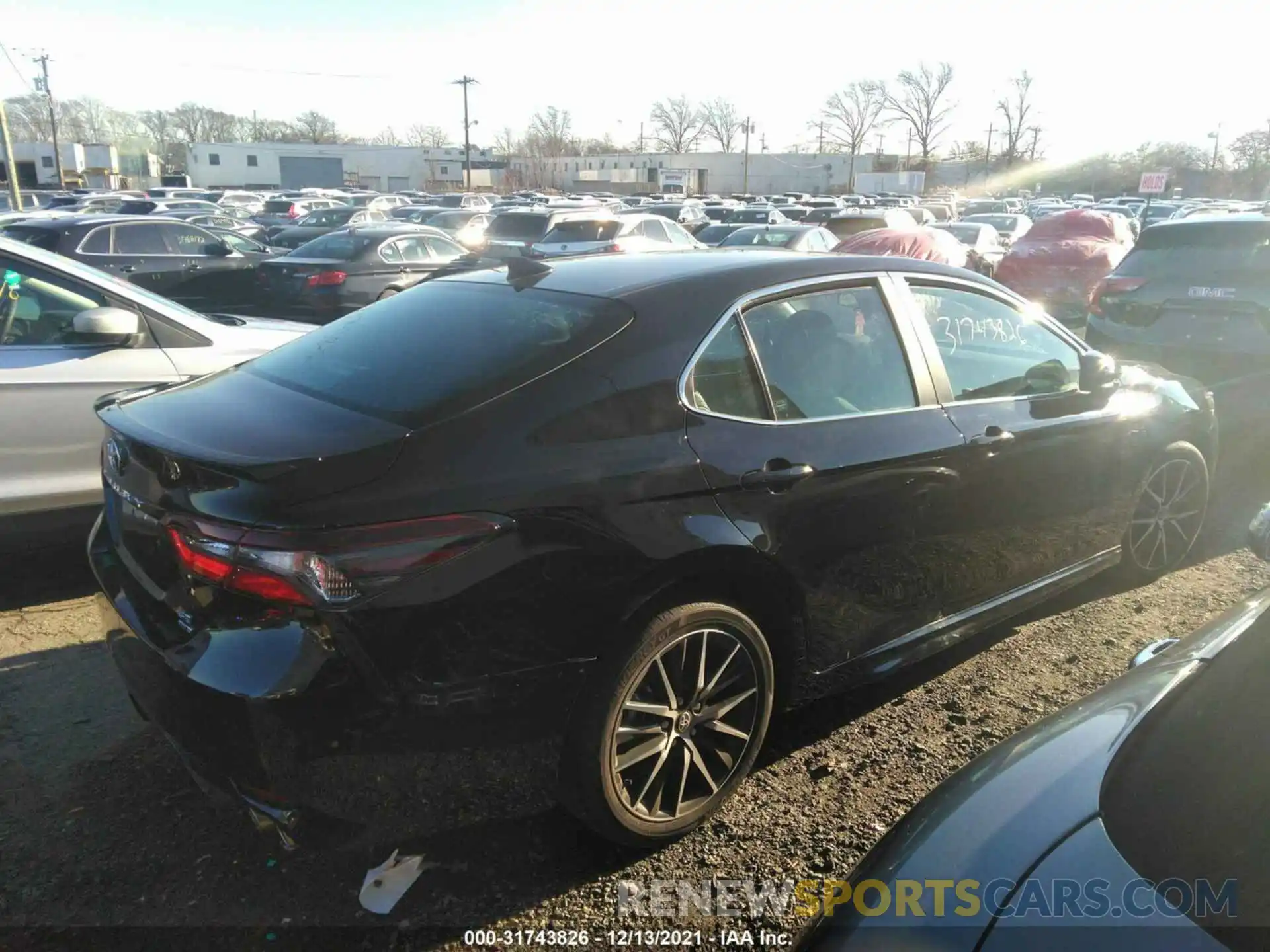 4 Photograph of a damaged car 4T1G11BK1MU032708 TOYOTA CAMRY 2021