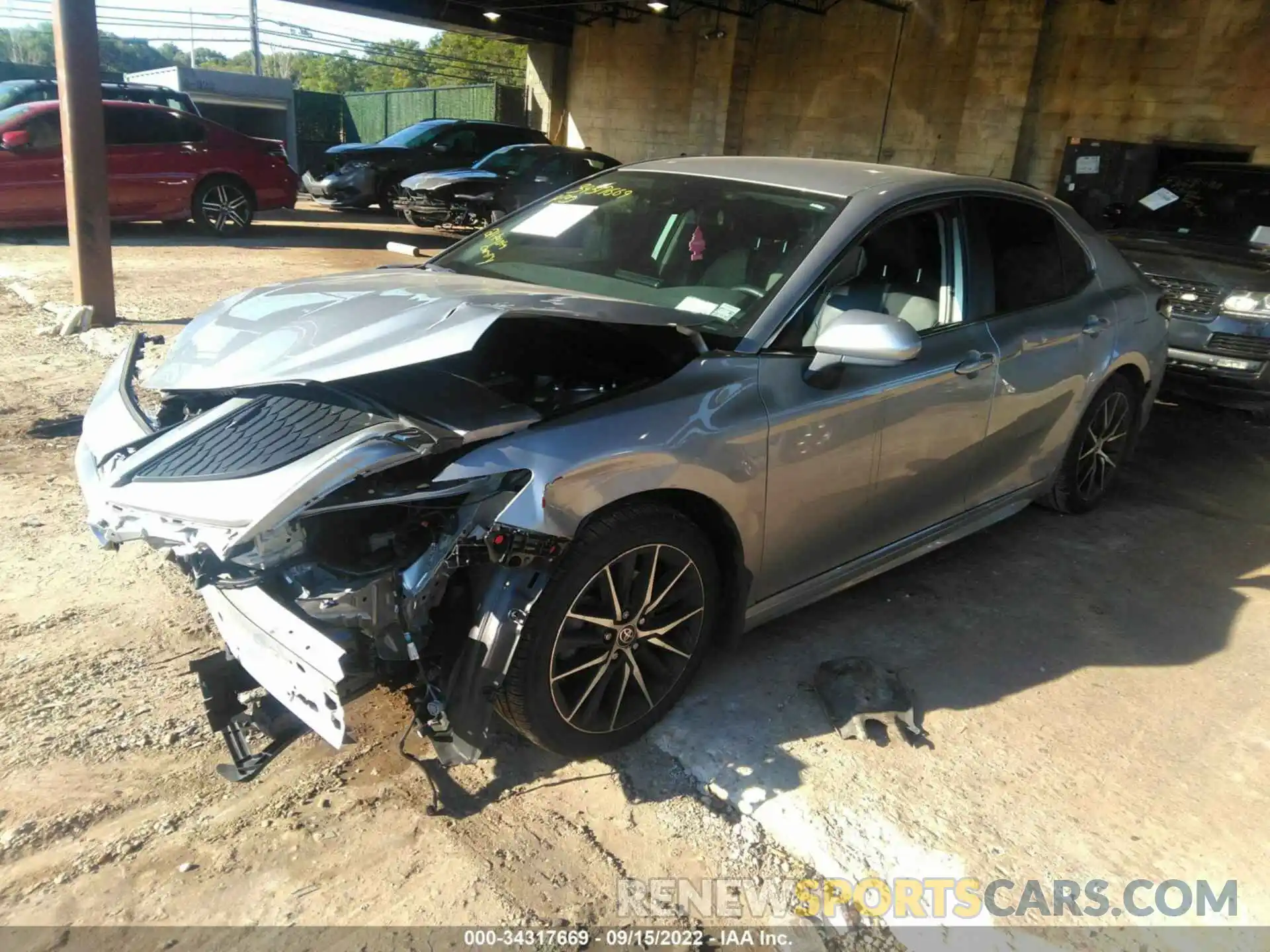 2 Photograph of a damaged car 4T1G11BK1MU038962 TOYOTA CAMRY 2021