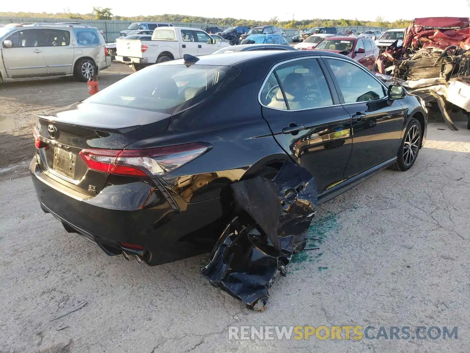 4 Photograph of a damaged car 4T1G11BK1MU040369 TOYOTA CAMRY 2021