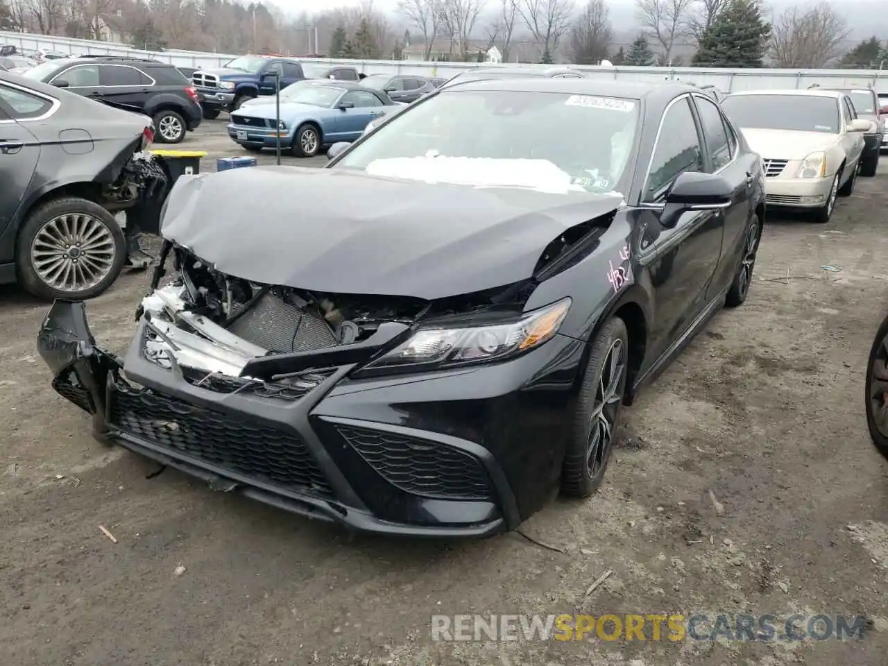 2 Photograph of a damaged car 4T1G11BK2MU030238 TOYOTA CAMRY 2021