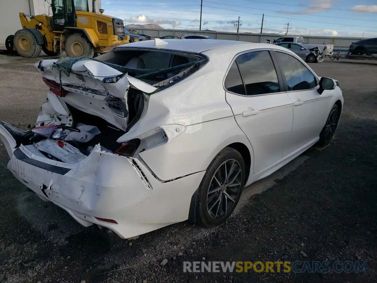 4 Photograph of a damaged car 4T1G11BK2MU032037 TOYOTA CAMRY 2021