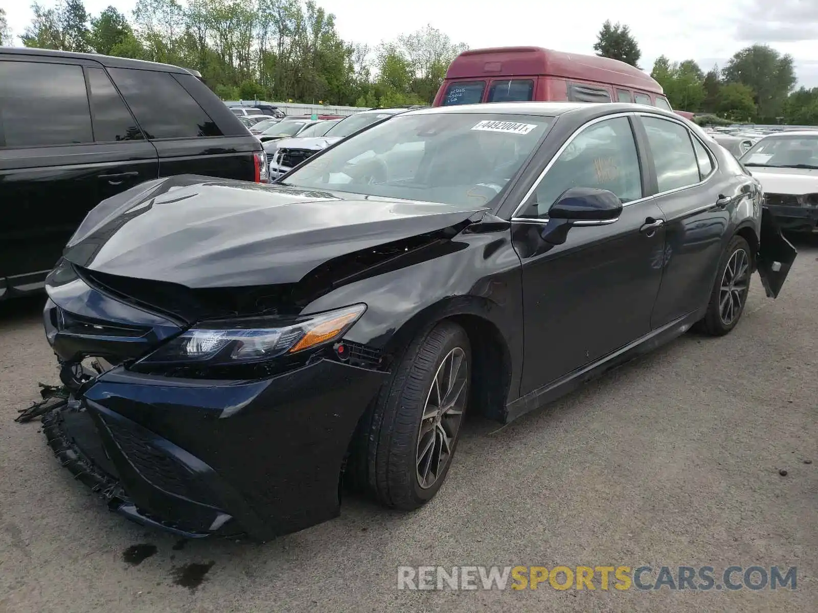 2 Photograph of a damaged car 4T1G11BK2MU033396 TOYOTA CAMRY 2021