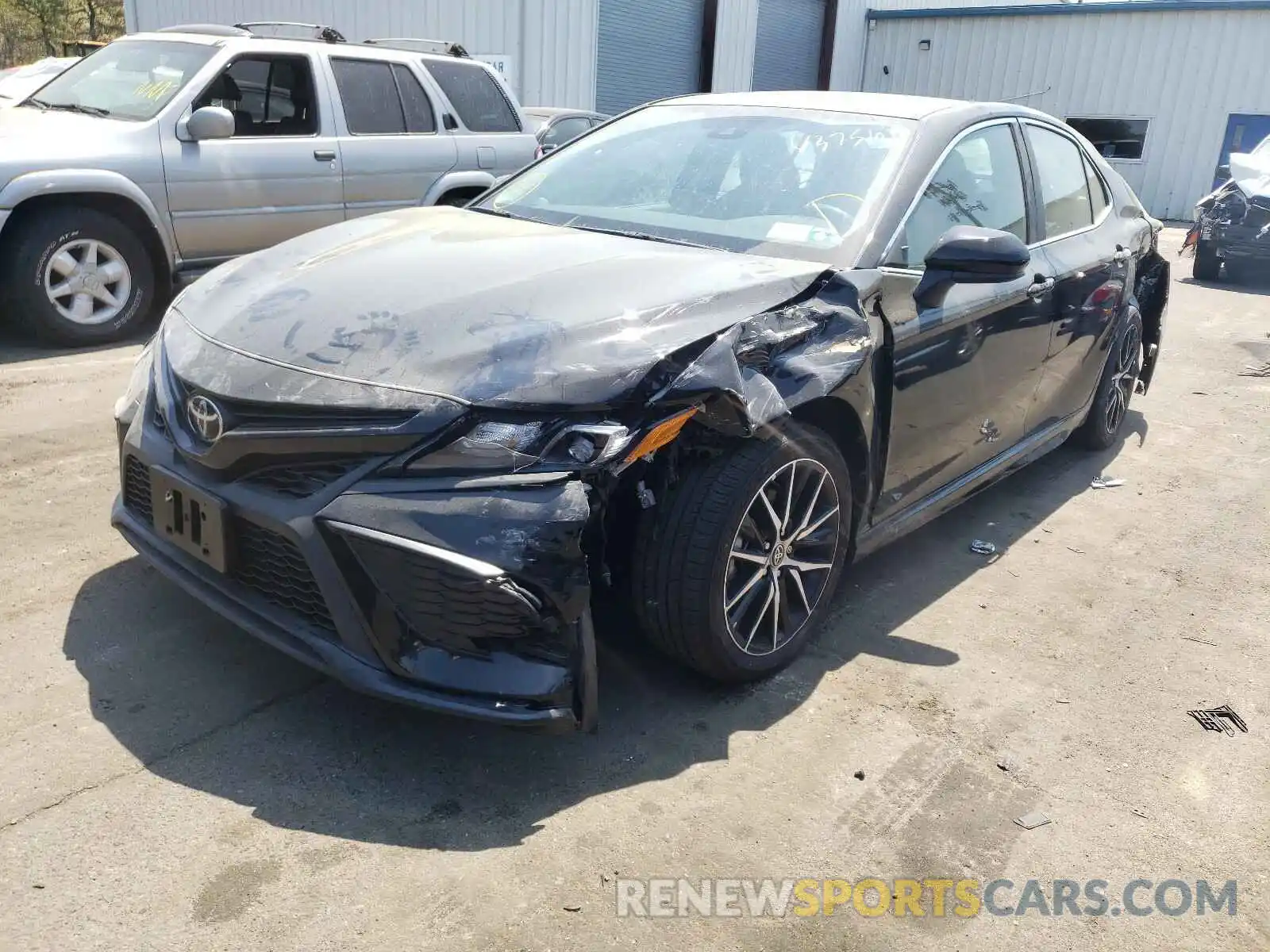 2 Photograph of a damaged car 4T1G11BK3MU020852 TOYOTA CAMRY 2021