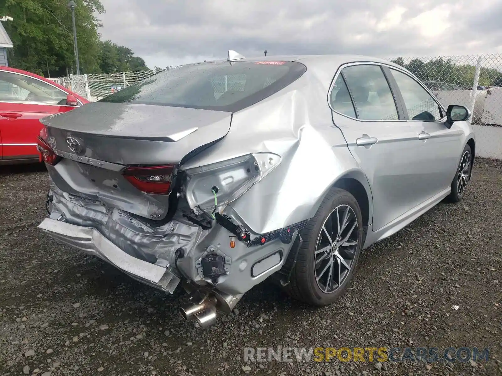 4 Photograph of a damaged car 4T1G11BK3MU023542 TOYOTA CAMRY 2021