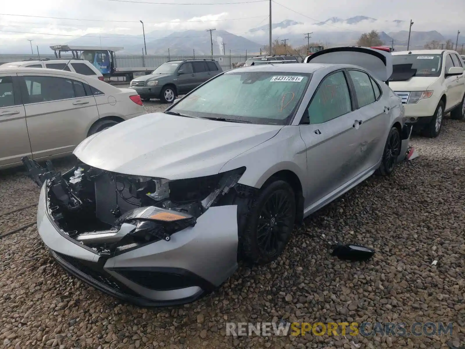 2 Photograph of a damaged car 4T1G11BK4MU033142 TOYOTA CAMRY 2021