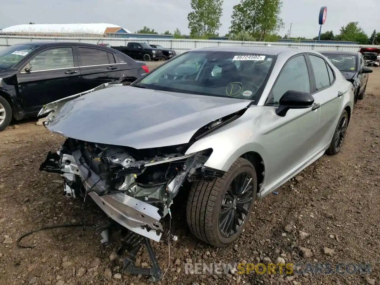 2 Photograph of a damaged car 4T1G11BK5MU021842 TOYOTA CAMRY 2021