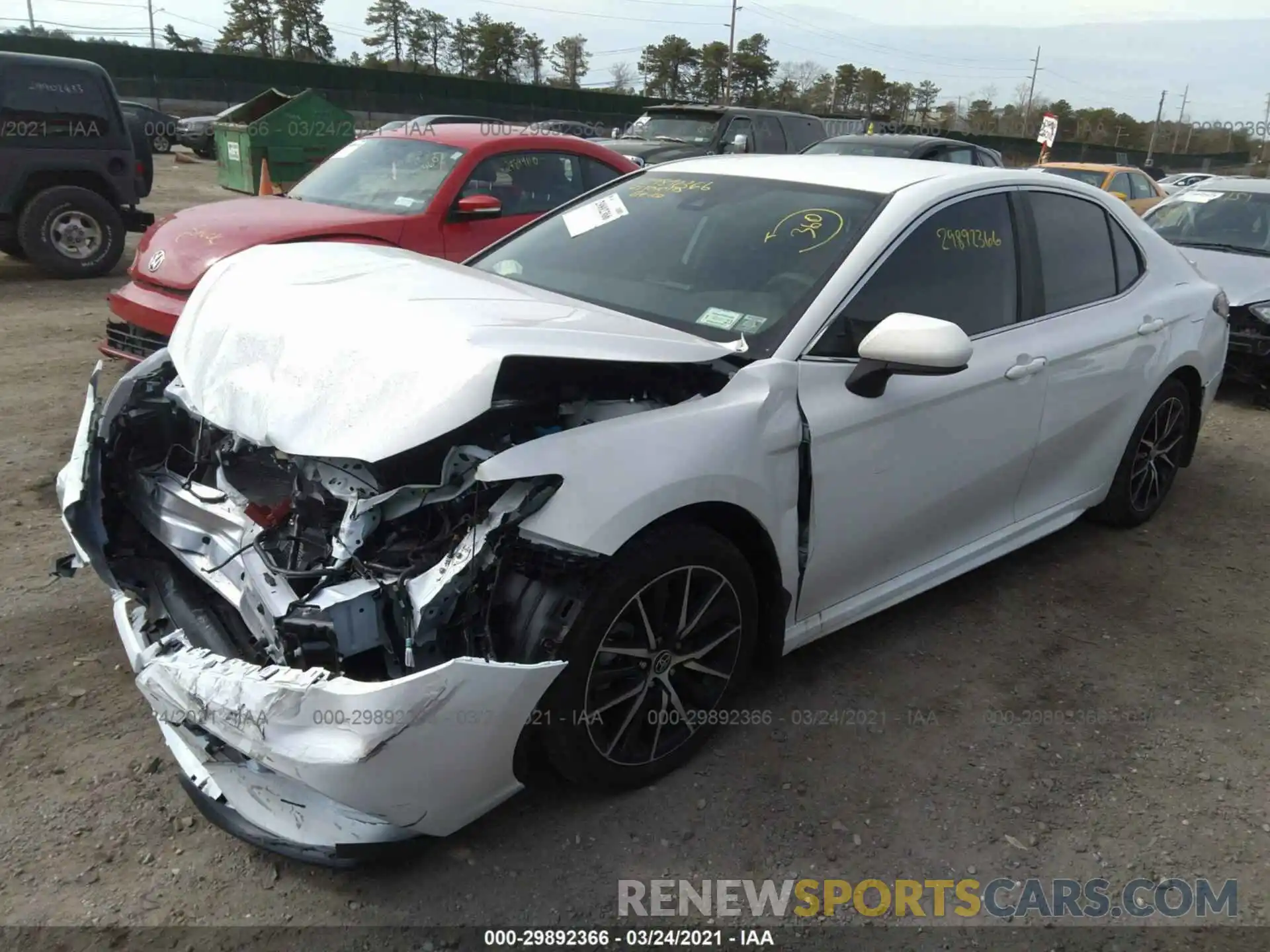 2 Photograph of a damaged car 4T1G11BK5MU024269 TOYOTA CAMRY 2021