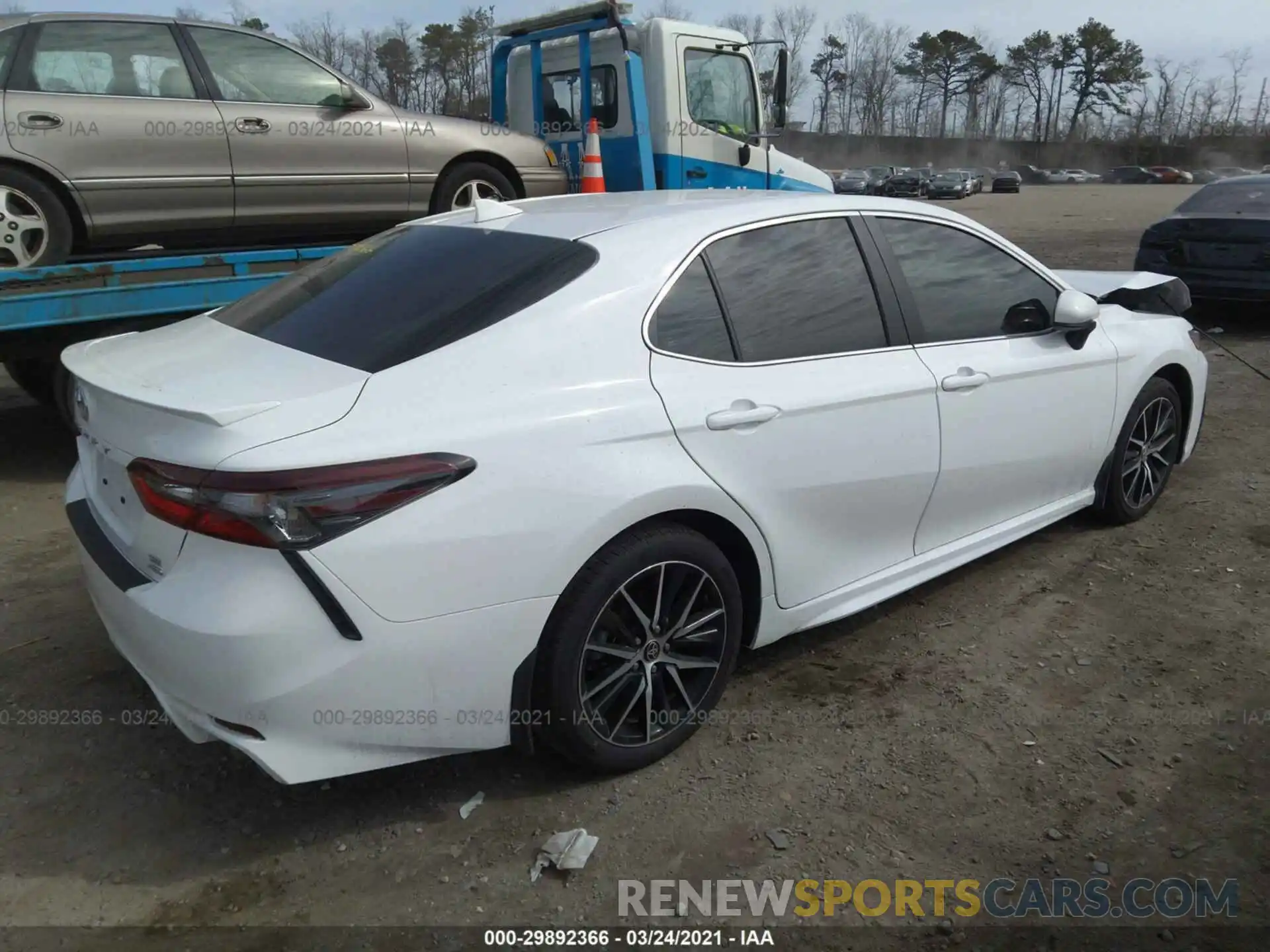 4 Photograph of a damaged car 4T1G11BK5MU024269 TOYOTA CAMRY 2021