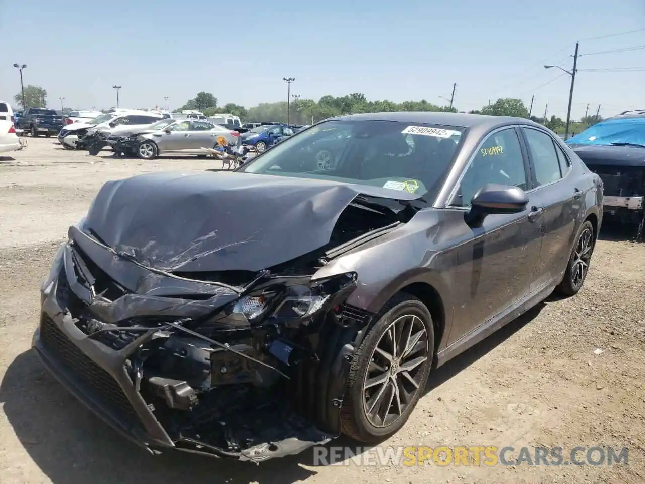 2 Photograph of a damaged car 4T1G11BK5MU024935 TOYOTA CAMRY 2021