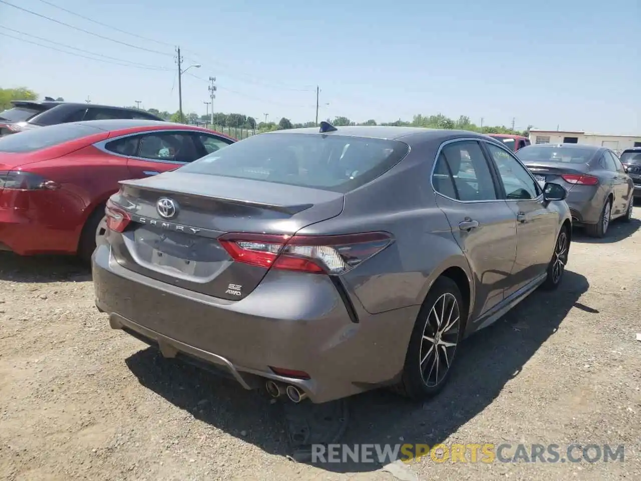 4 Photograph of a damaged car 4T1G11BK5MU024935 TOYOTA CAMRY 2021