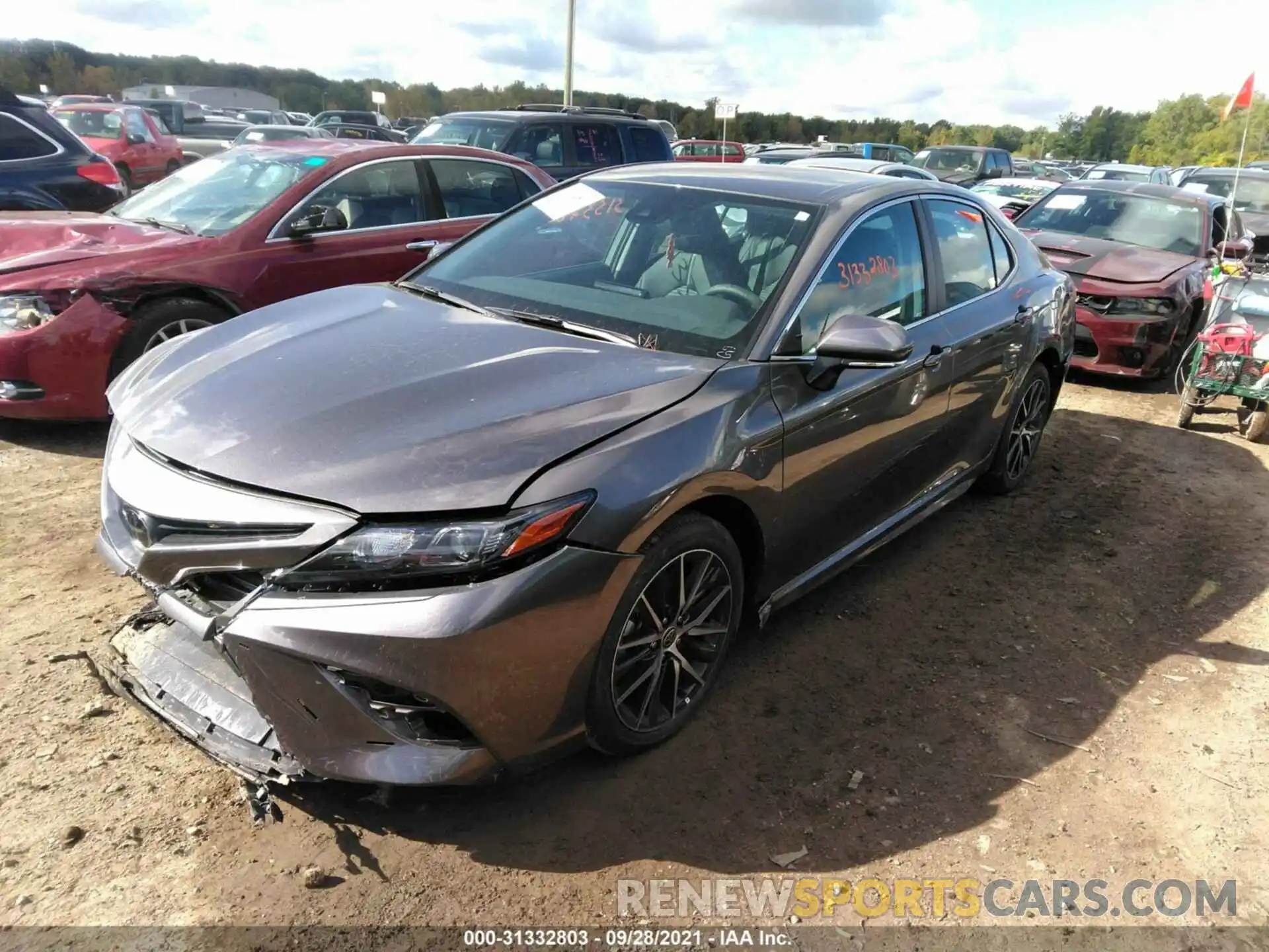 2 Photograph of a damaged car 4T1G11BK5MU046188 TOYOTA CAMRY 2021