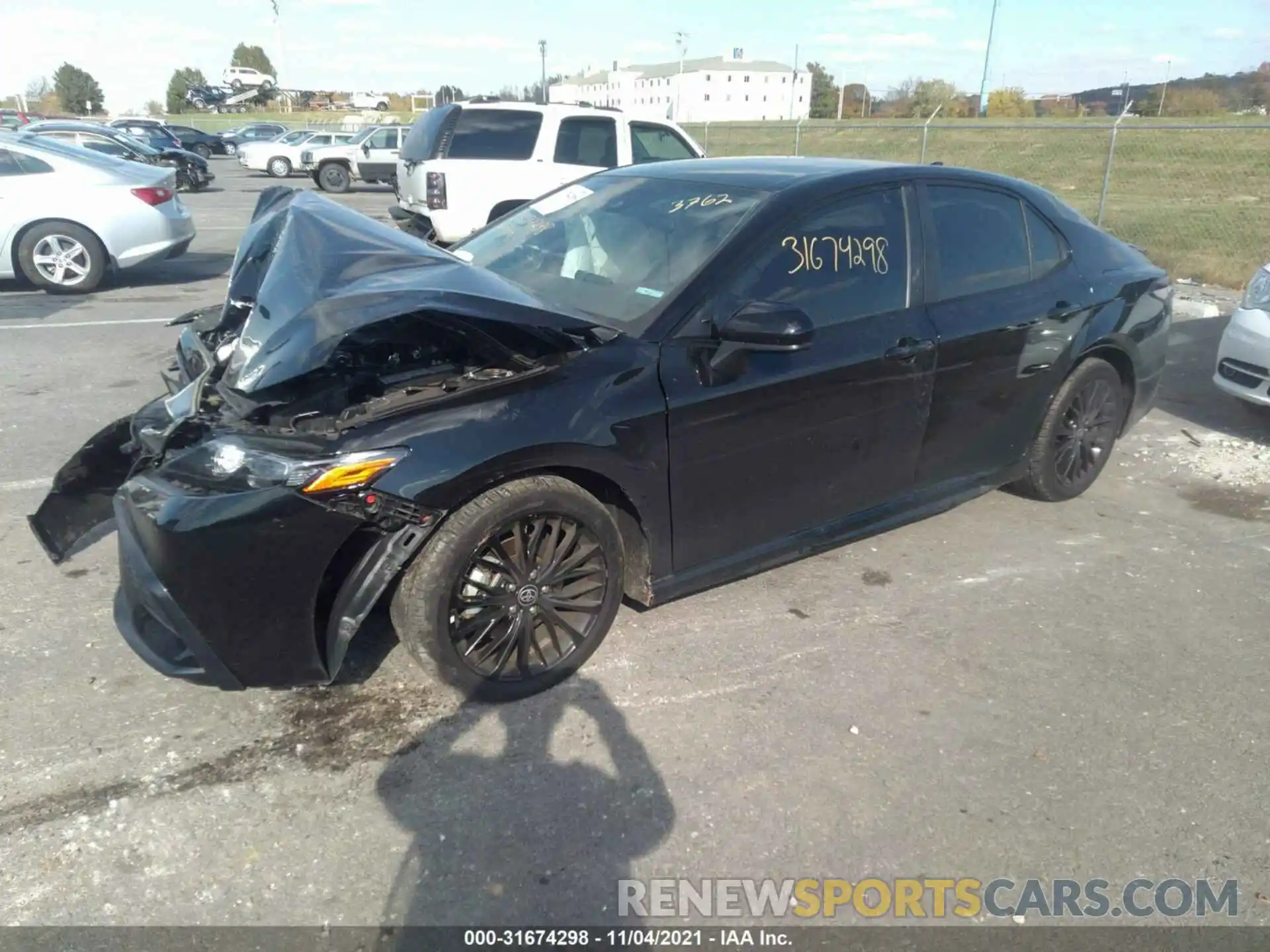 2 Photograph of a damaged car 4T1G11BK6MU023762 TOYOTA CAMRY 2021