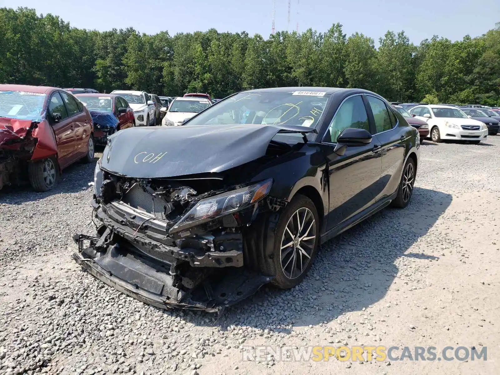 2 Photograph of a damaged car 4T1G11BK6MU023910 TOYOTA CAMRY 2021