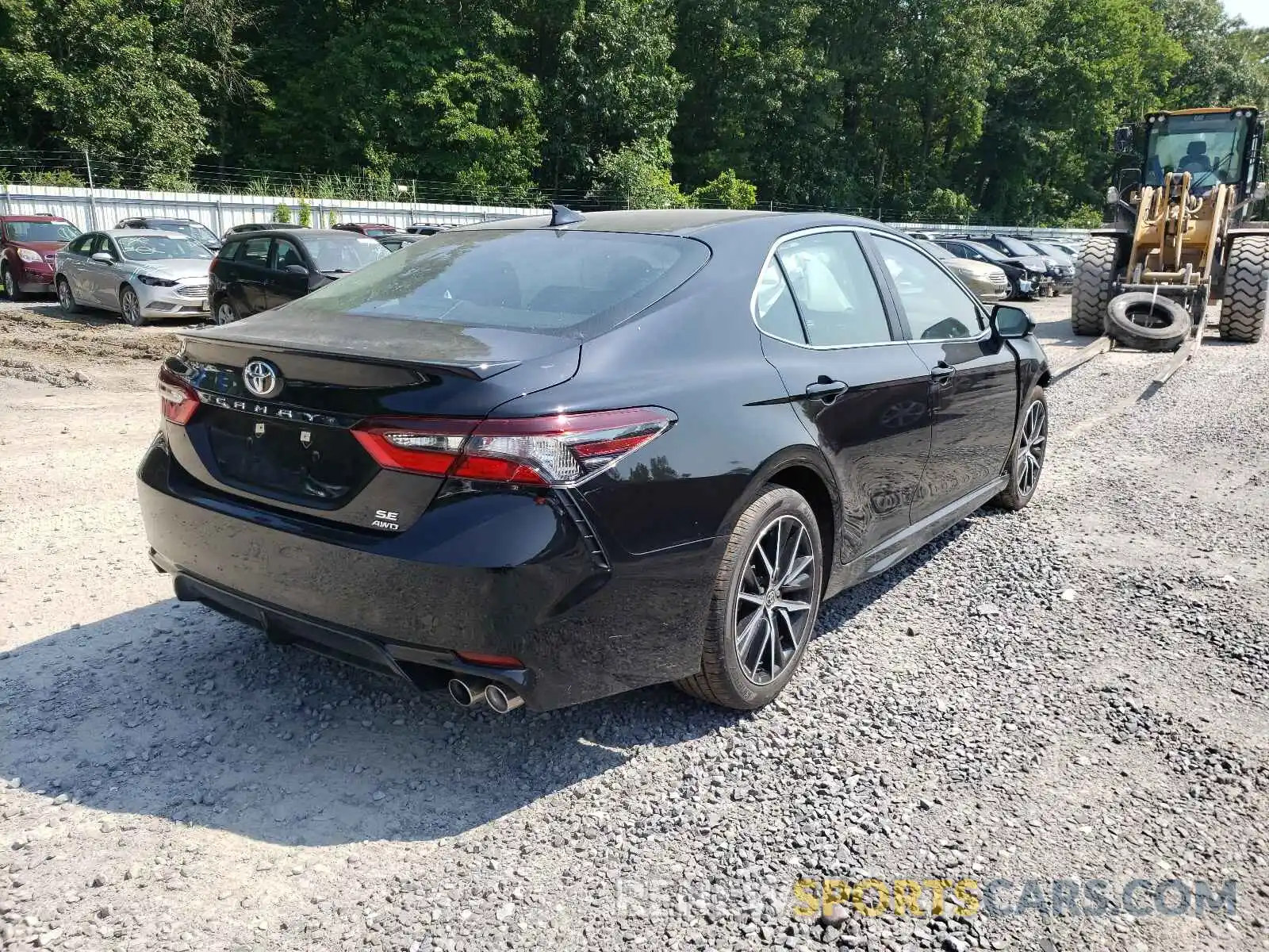 4 Photograph of a damaged car 4T1G11BK6MU023910 TOYOTA CAMRY 2021