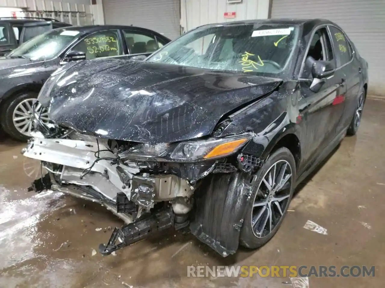 2 Photograph of a damaged car 4T1G11BK6MU025477 TOYOTA CAMRY 2021