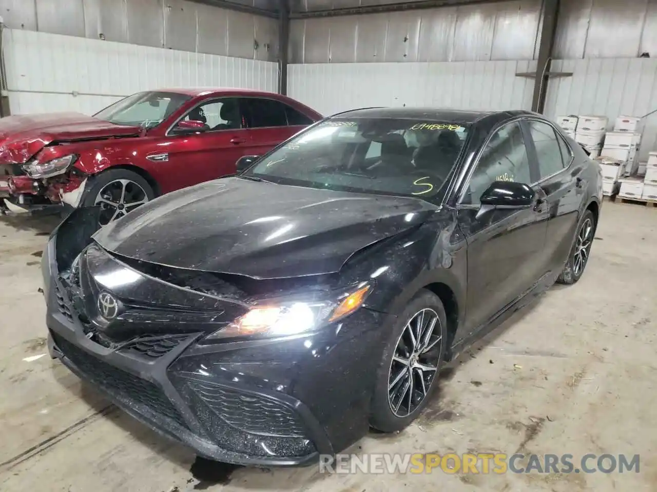 2 Photograph of a damaged car 4T1G11BK6MU029867 TOYOTA CAMRY 2021