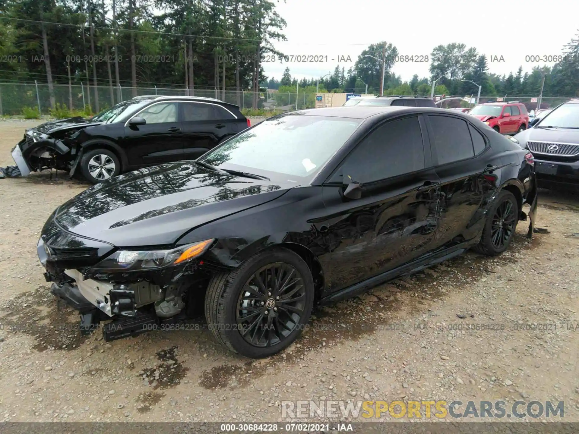 2 Photograph of a damaged car 4T1G11BK6MU031991 TOYOTA CAMRY 2021