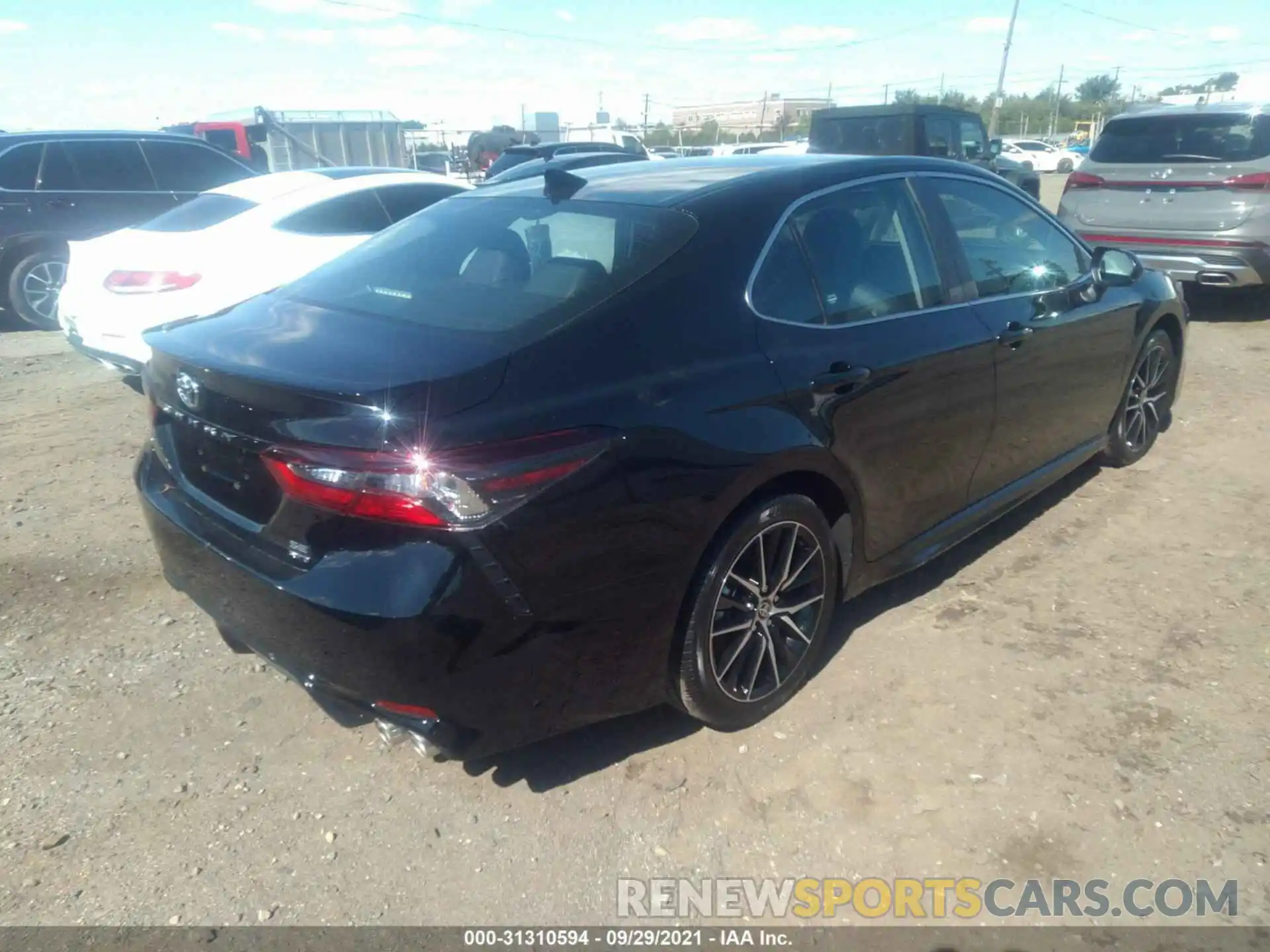 4 Photograph of a damaged car 4T1G11BK6MU044188 TOYOTA CAMRY 2021