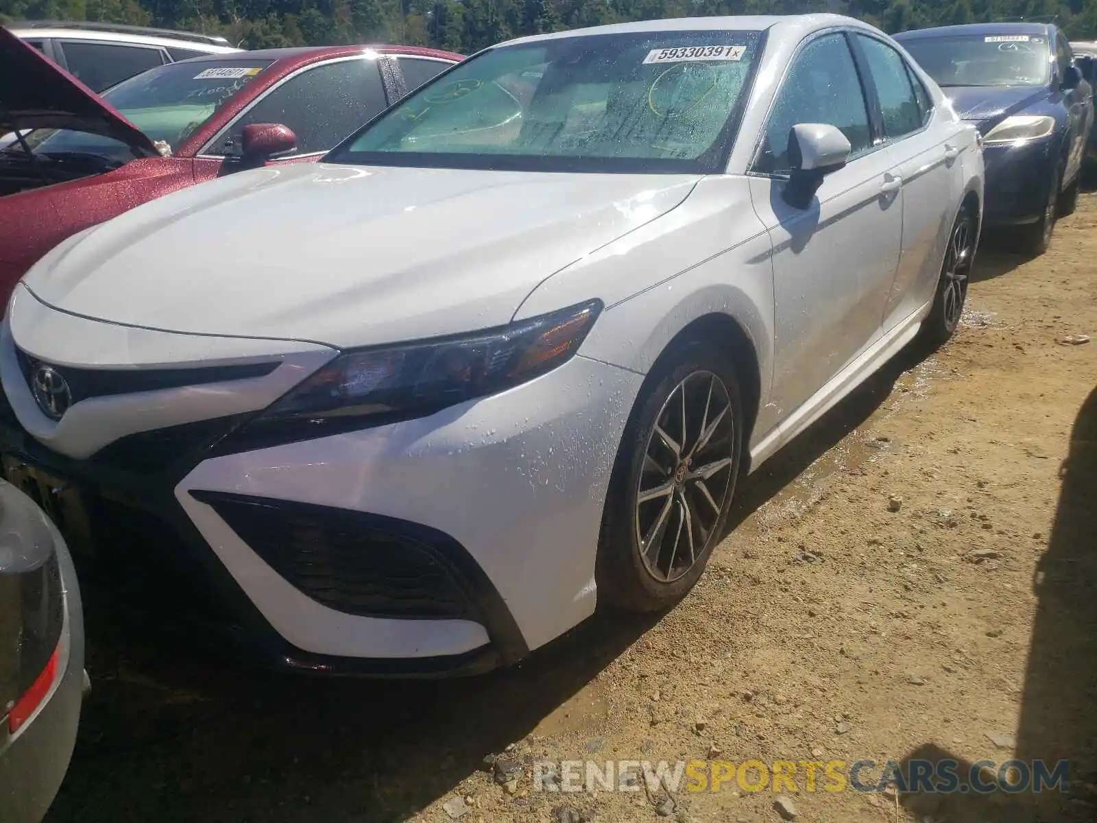 2 Photograph of a damaged car 4T1G11BK7MU043552 TOYOTA CAMRY 2021