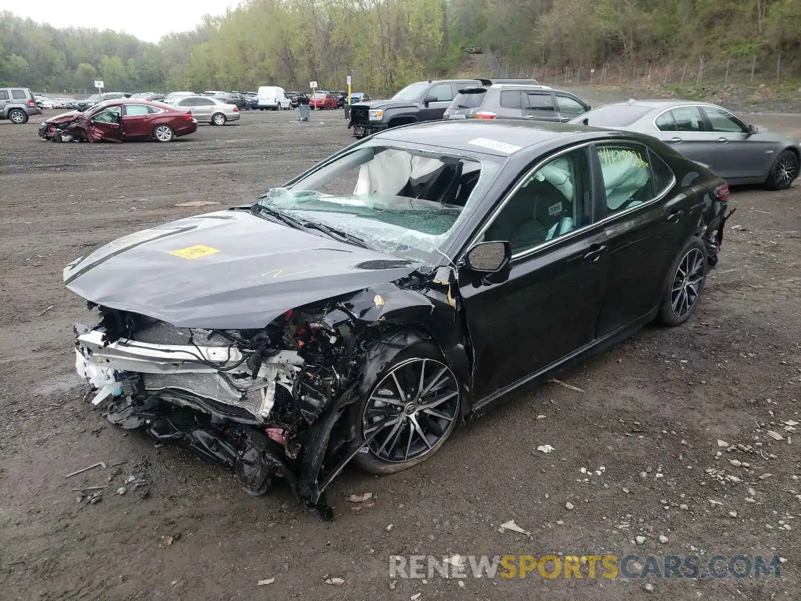 2 Photograph of a damaged car 4T1G11BK8MU027716 TOYOTA CAMRY 2021