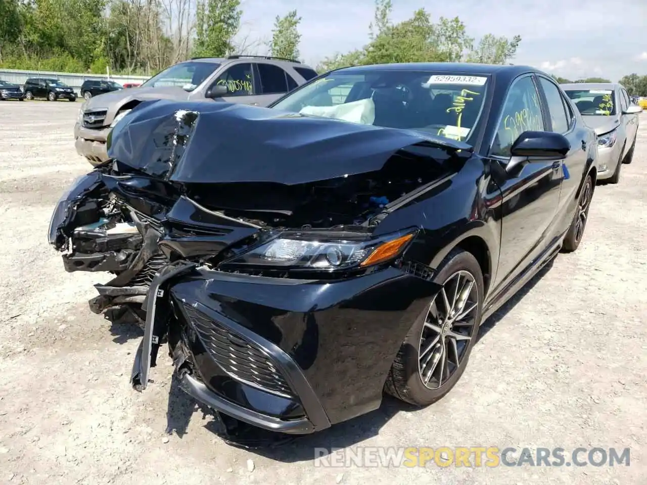 2 Photograph of a damaged car 4T1G11BKXMU025093 TOYOTA CAMRY 2021