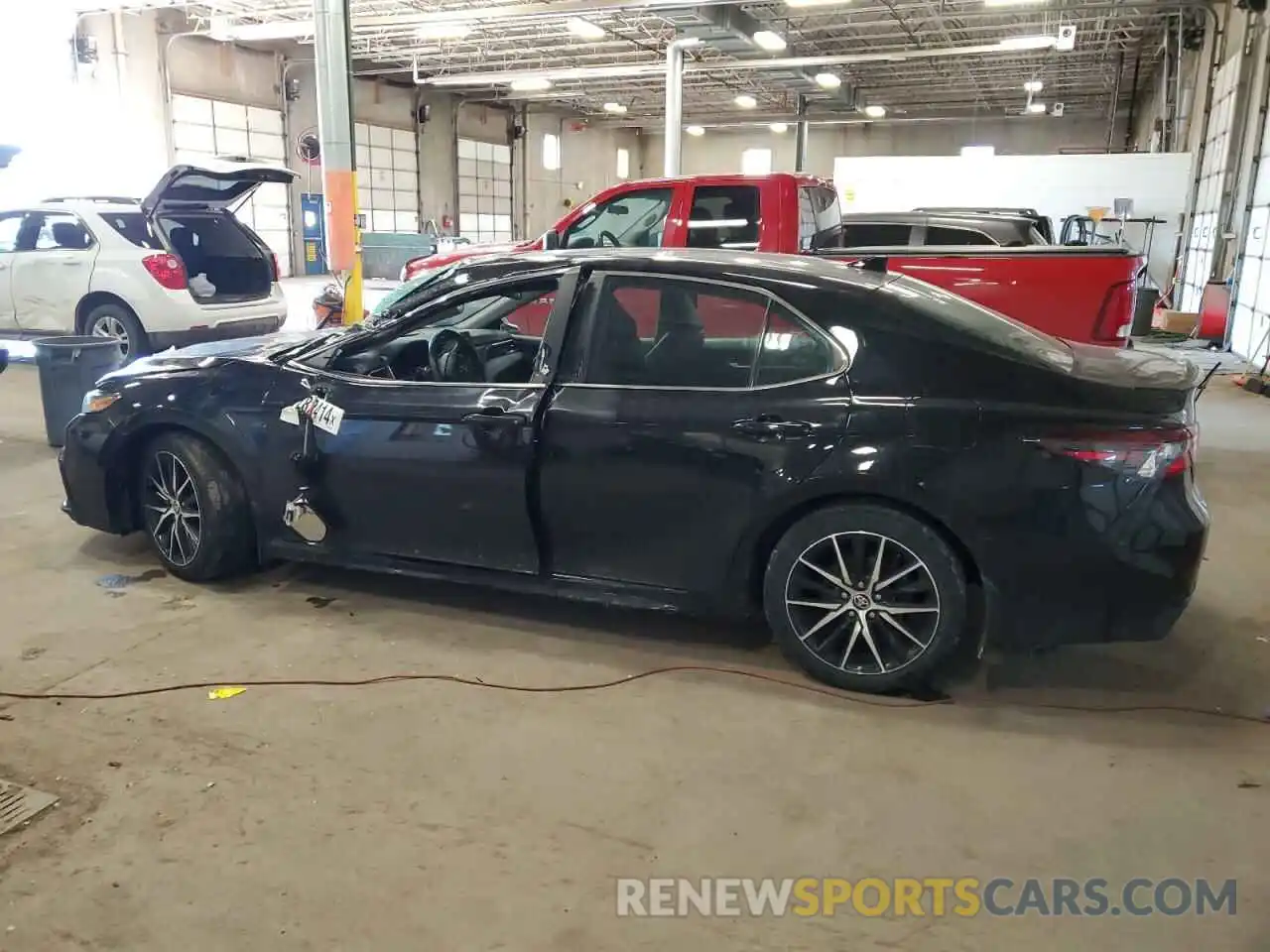 2 Photograph of a damaged car 4T1G11BKXMU026860 TOYOTA CAMRY 2021