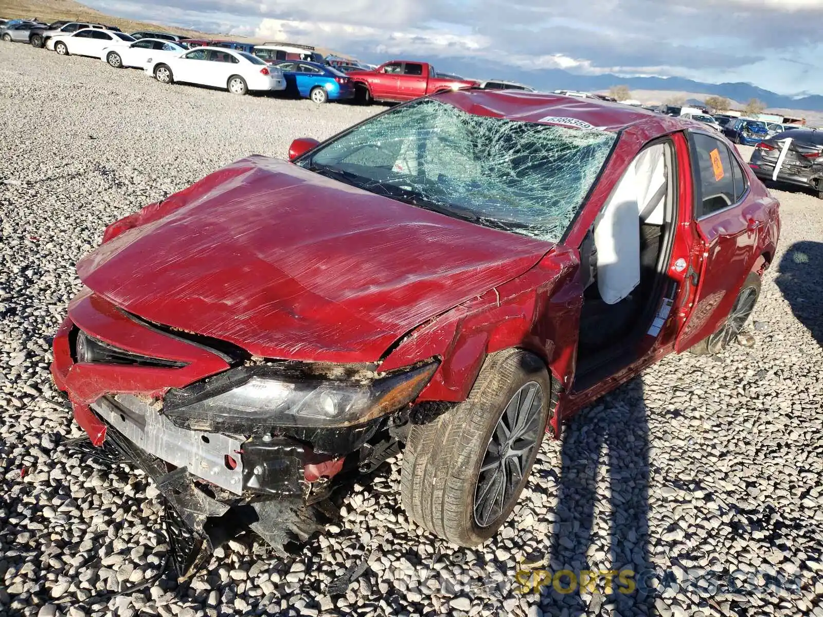 2 Photograph of a damaged car 4T1G11BKXMU032979 TOYOTA CAMRY 2021