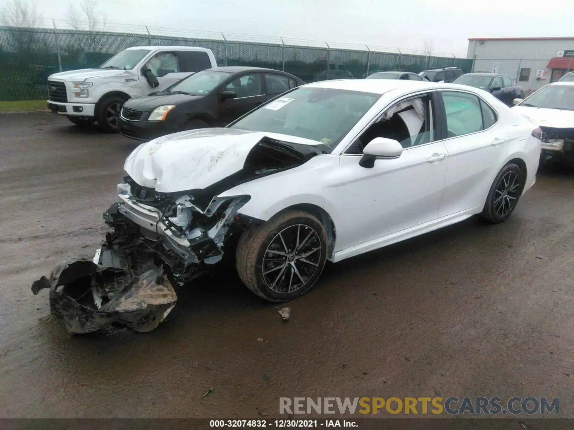 2 Photograph of a damaged car 4T1G11BKXMU034618 TOYOTA CAMRY 2021