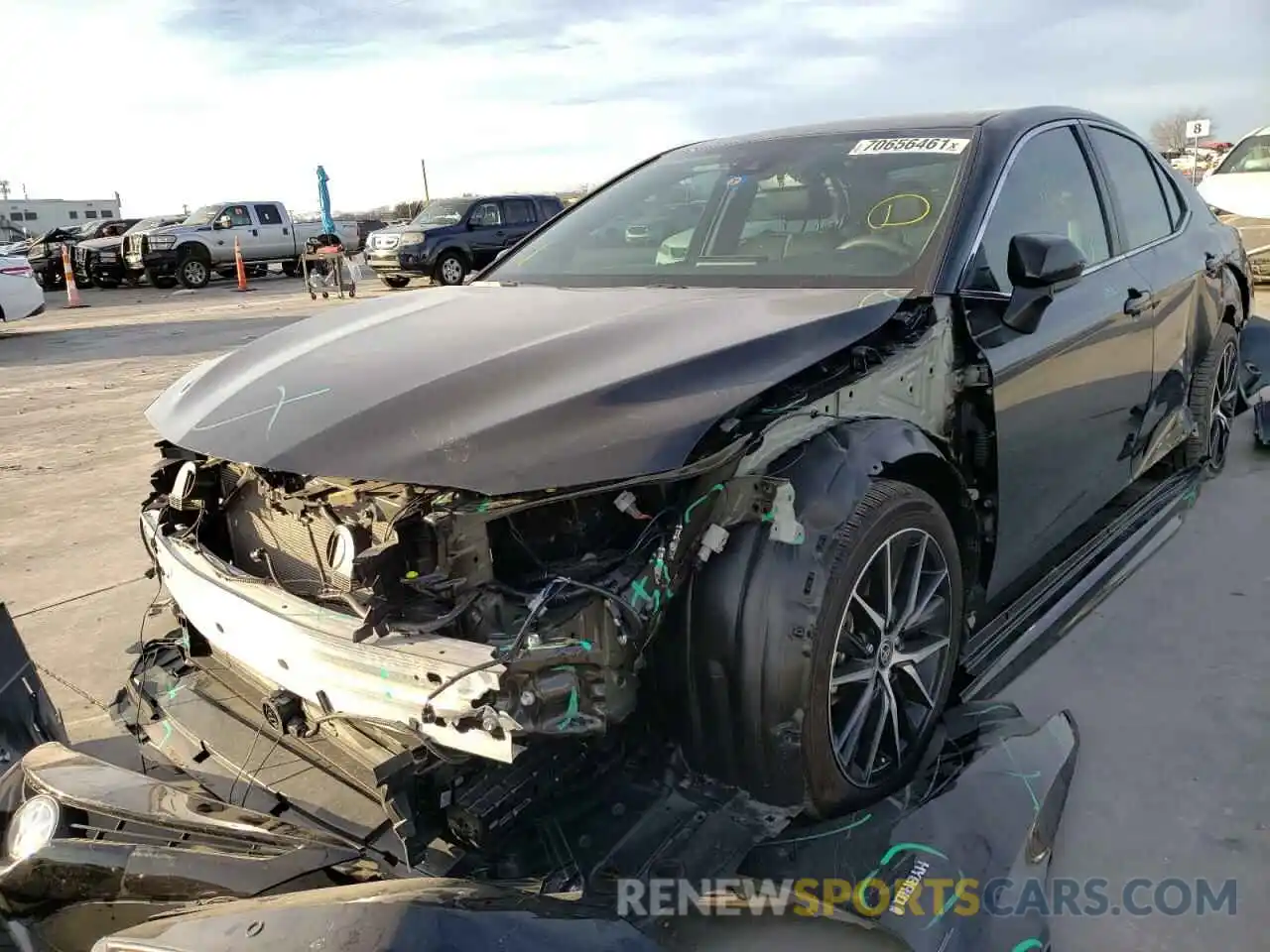 2 Photograph of a damaged car 4T1G31AK3MU029384 TOYOTA CAMRY 2021