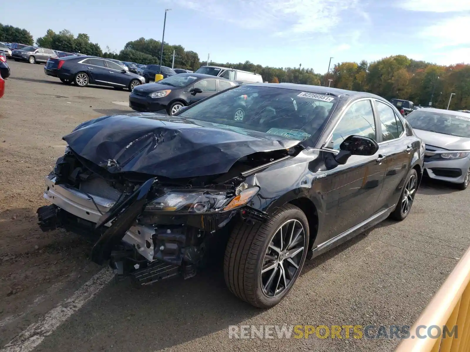 2 Photograph of a damaged car 4T1G31AK5MU557234 TOYOTA CAMRY 2021