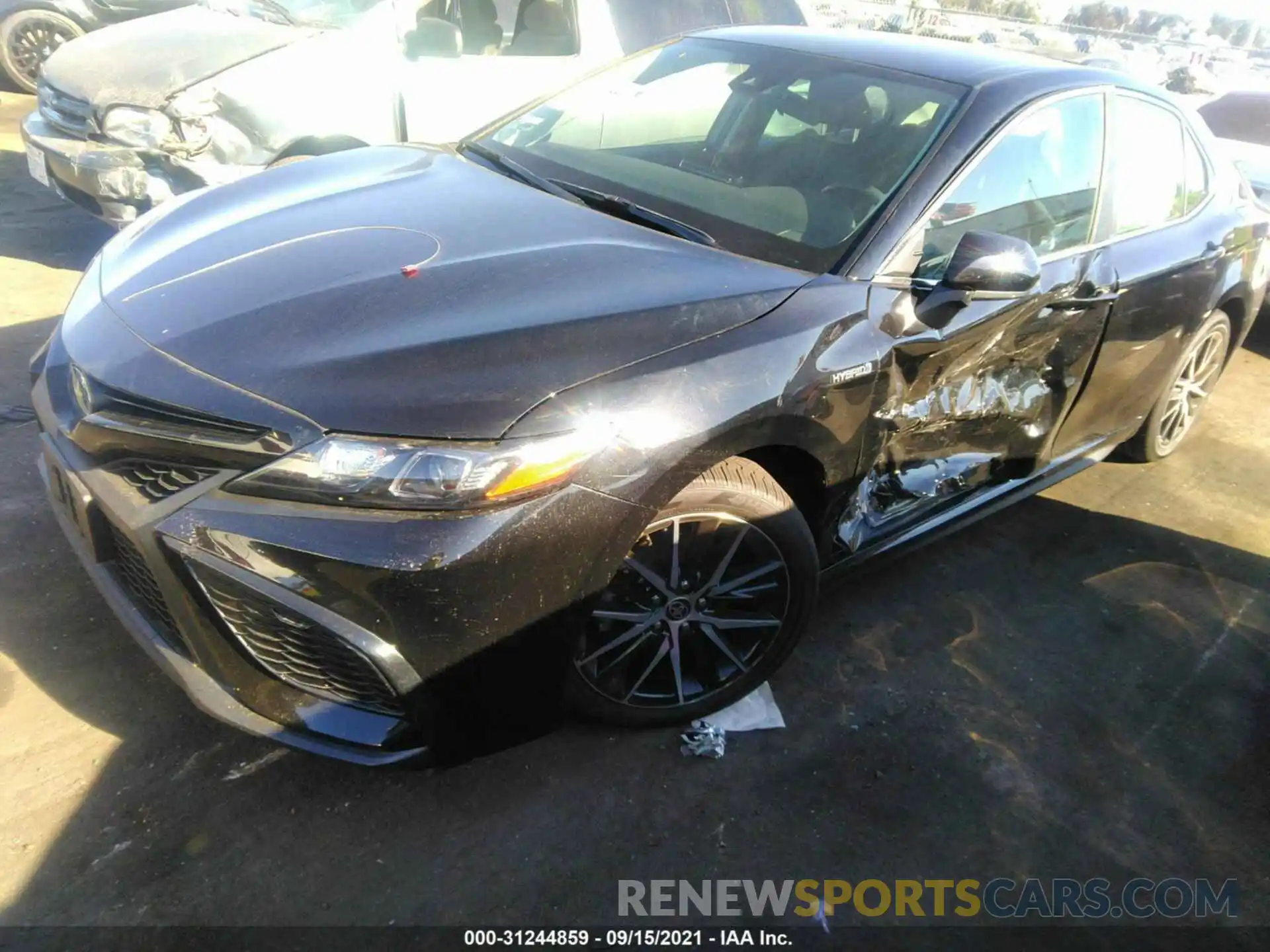 2 Photograph of a damaged car 4T1G31AK7MU557879 TOYOTA CAMRY 2021