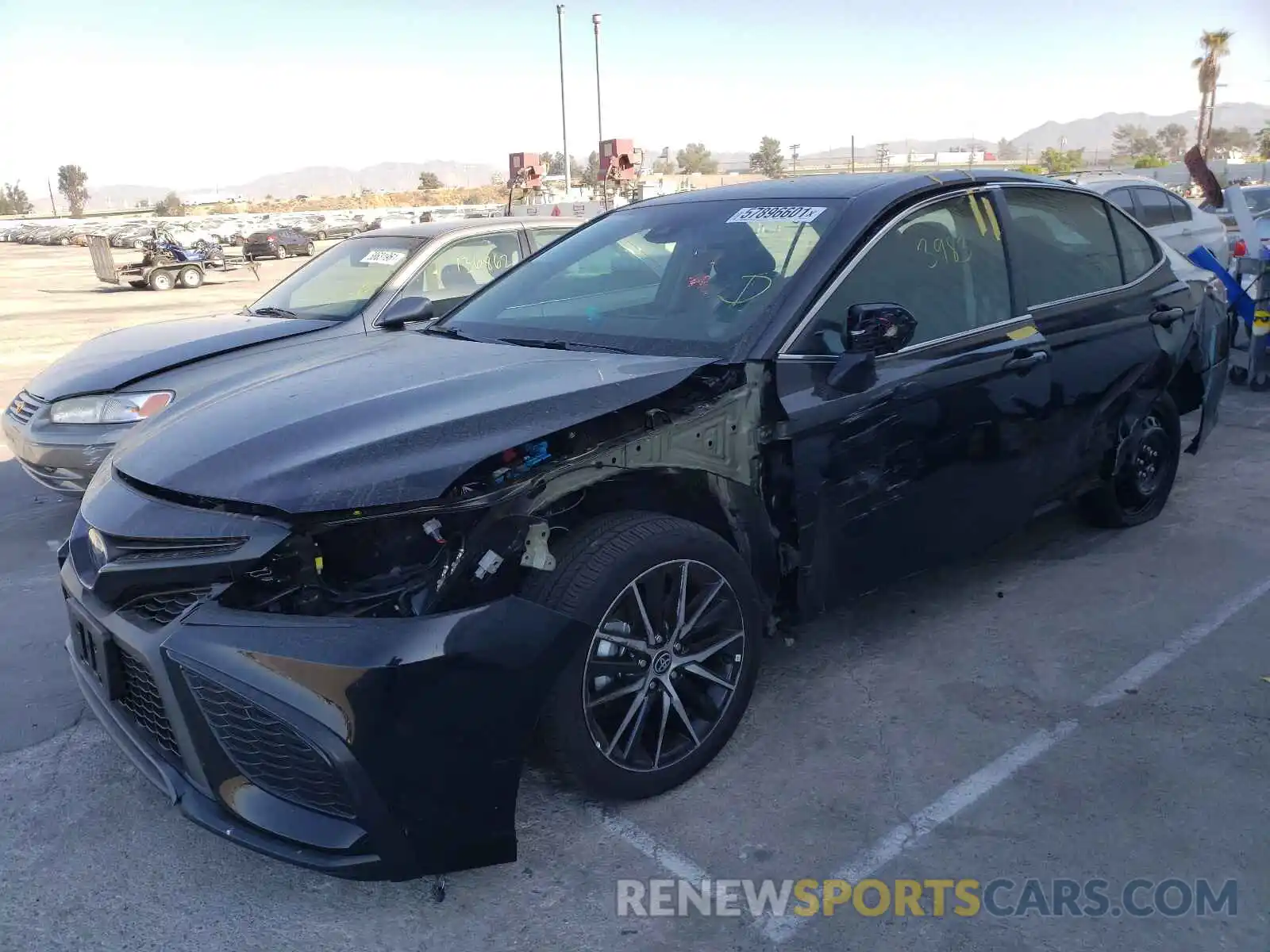 2 Photograph of a damaged car 4T1G31AK8MU557647 TOYOTA CAMRY 2021