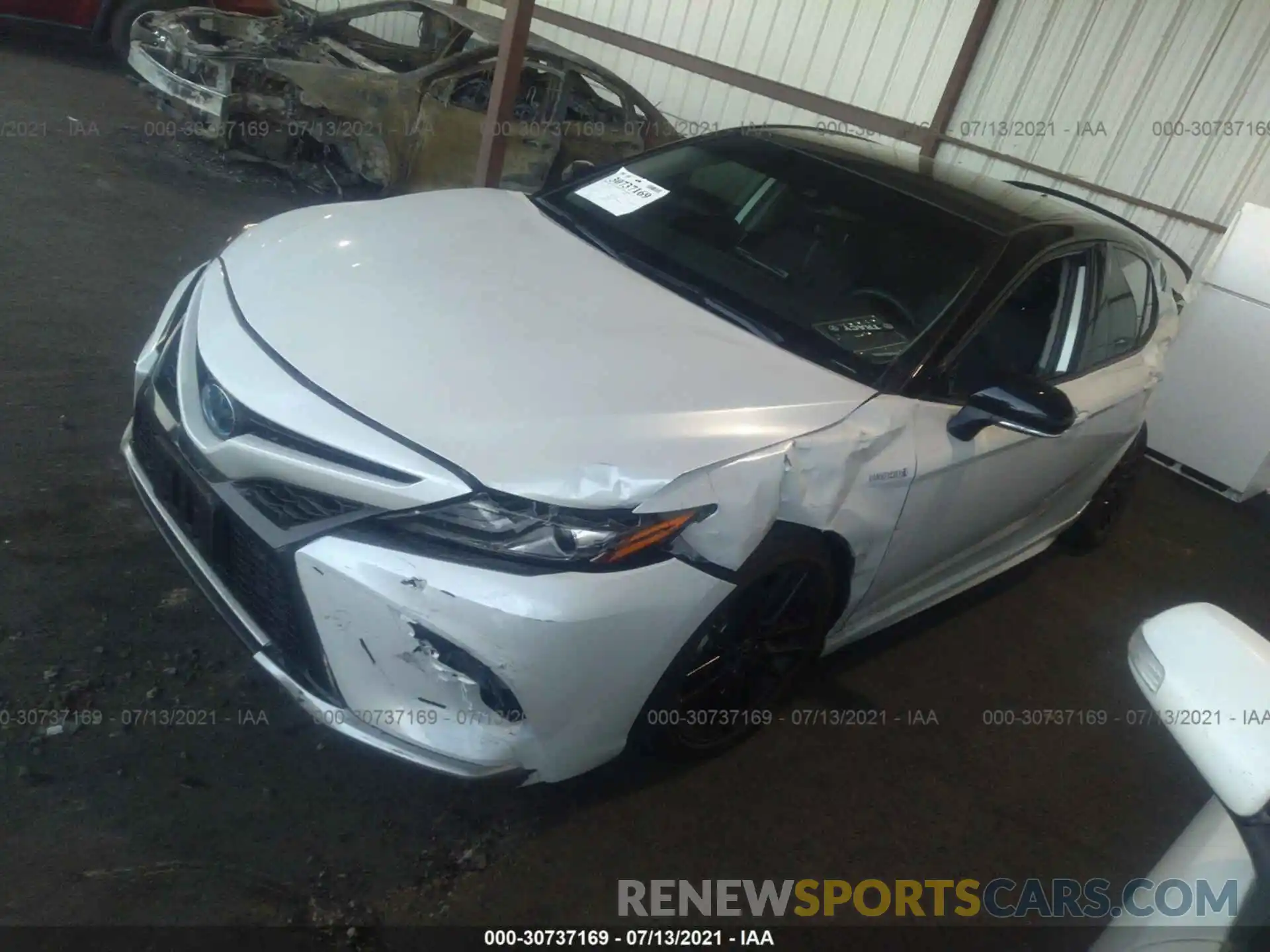 2 Photograph of a damaged car 4T1K31AK7MU024327 TOYOTA CAMRY 2021