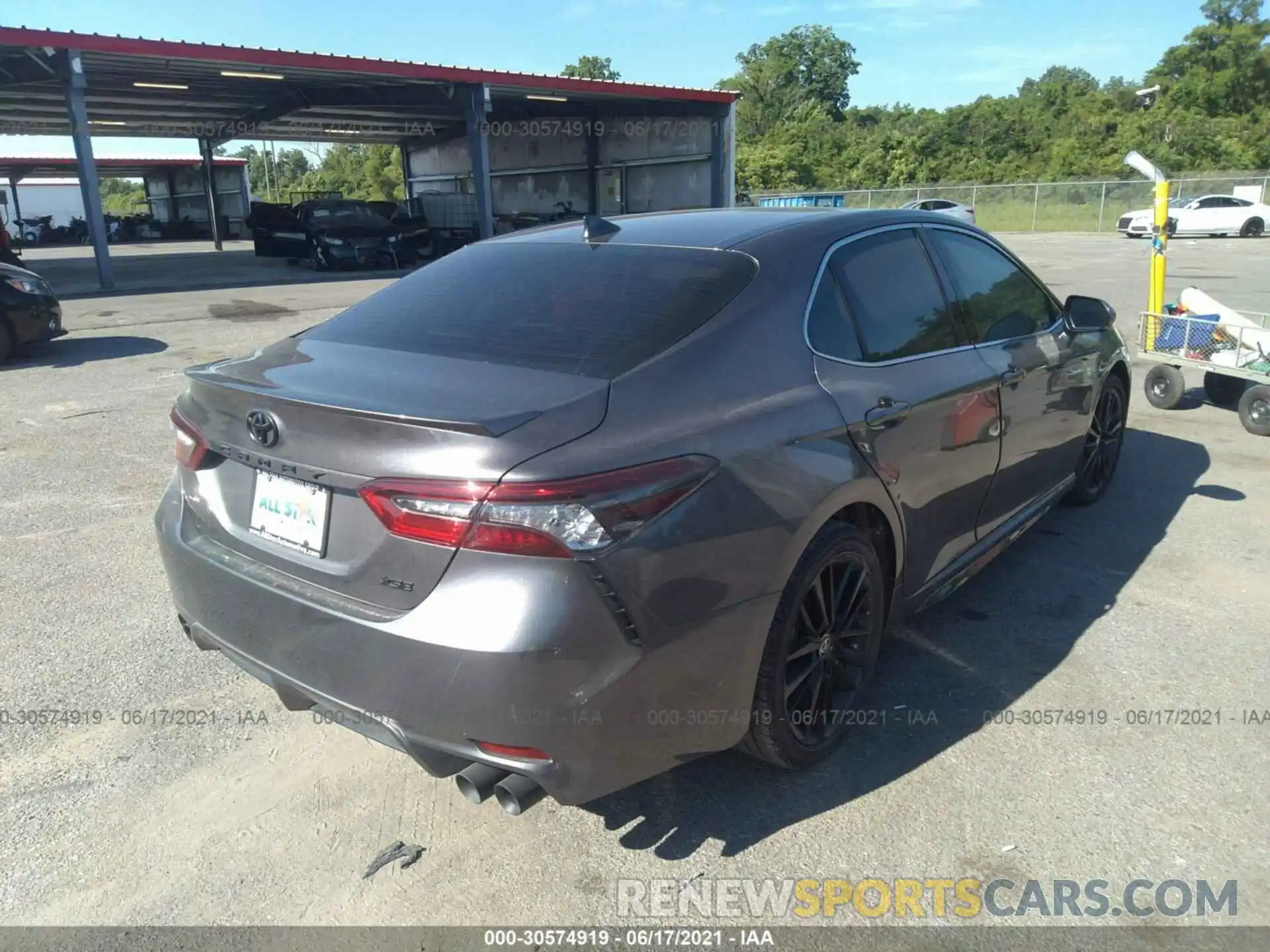 4 Photograph of a damaged car 4T1K61AK2MU559959 TOYOTA CAMRY 2021